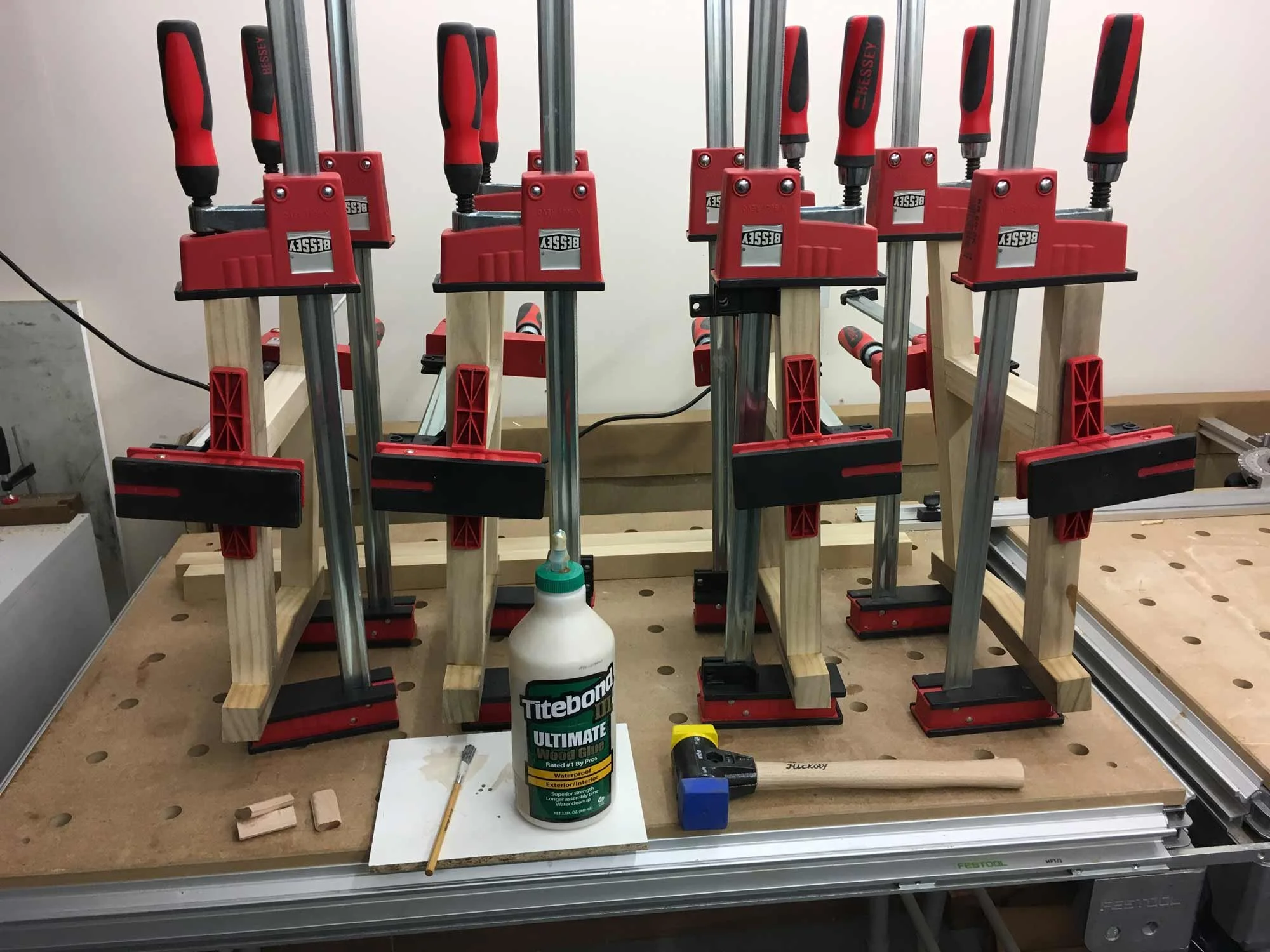 Wooden components being clamped