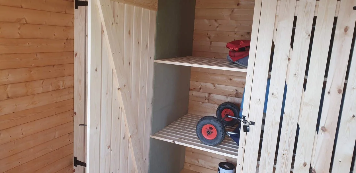Shelving and storage in summer house