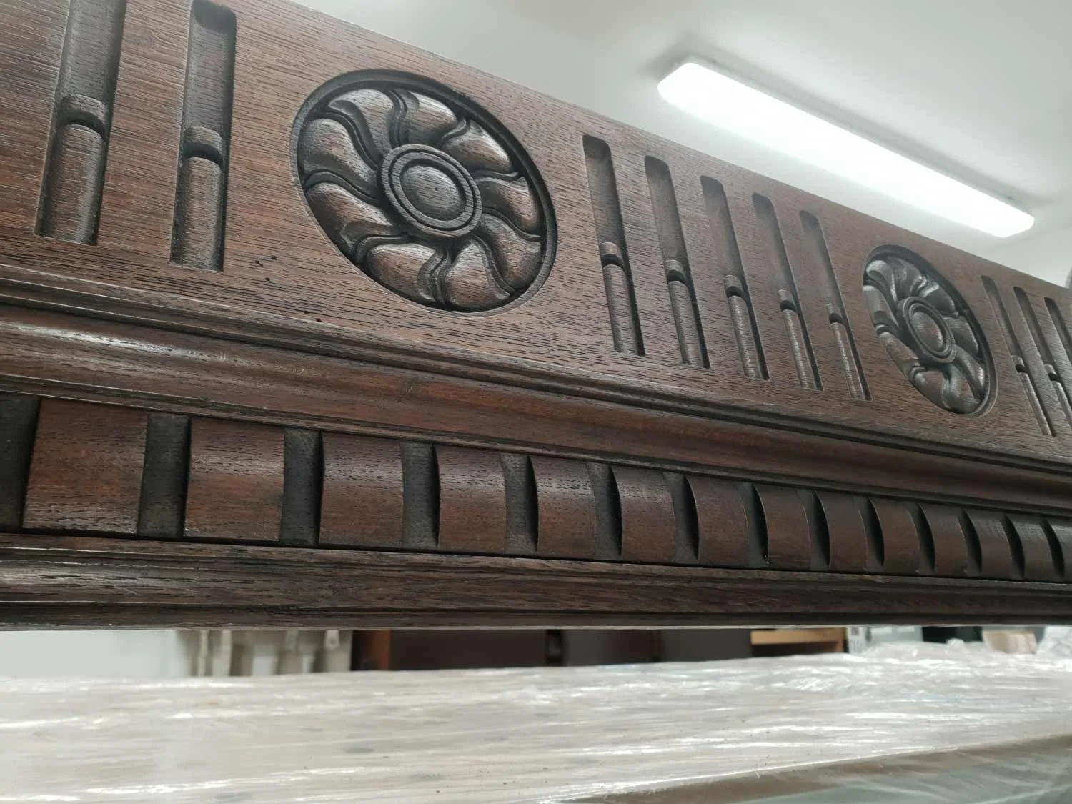 Detail of restored oak fireplace