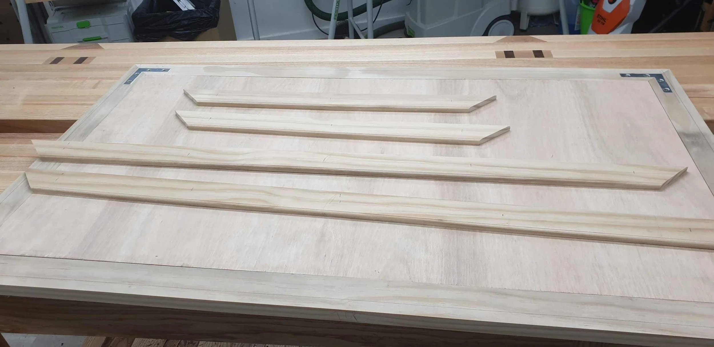 Frame backing strips machined