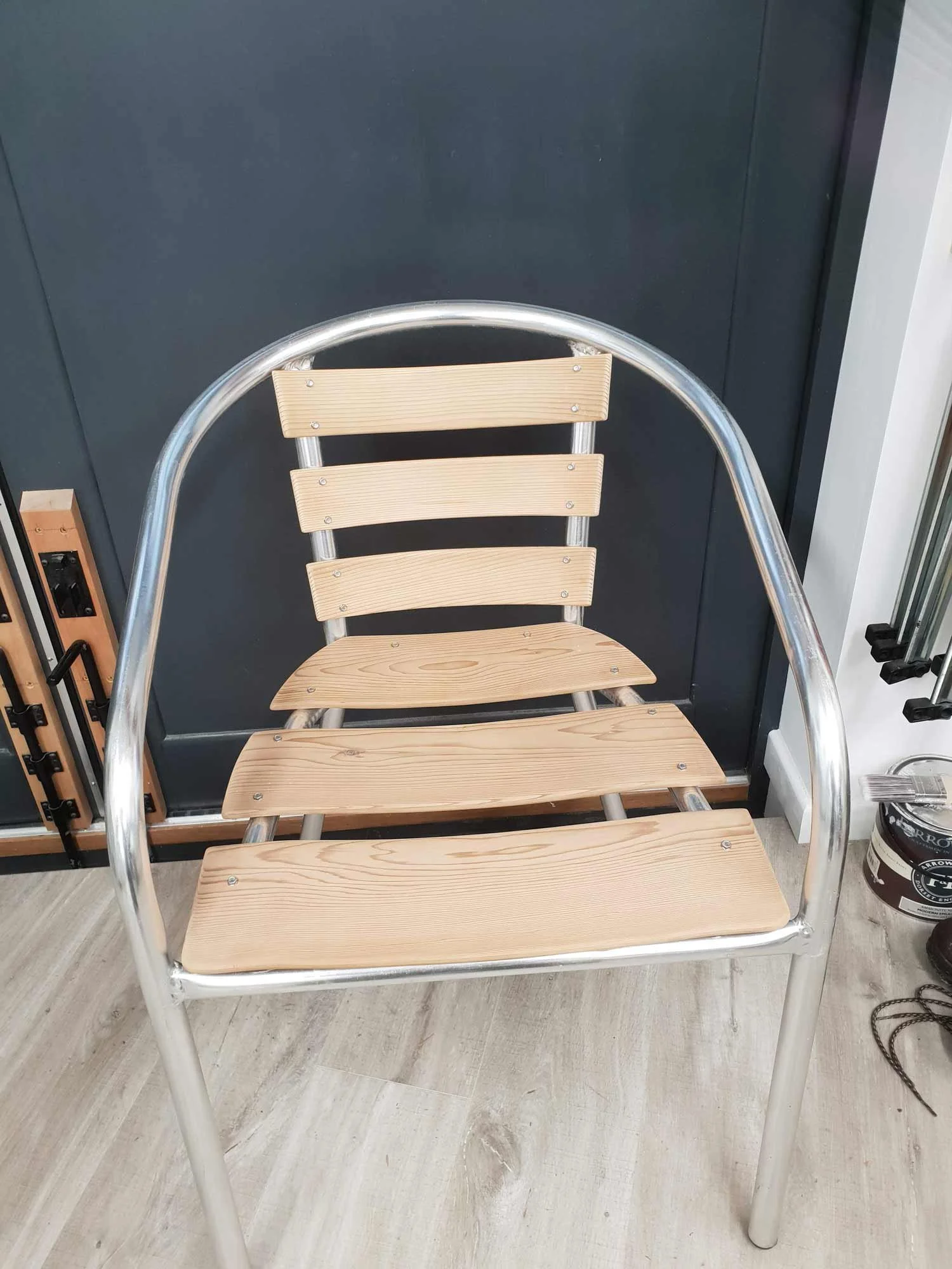 Upcycled chair with curved cedar slats