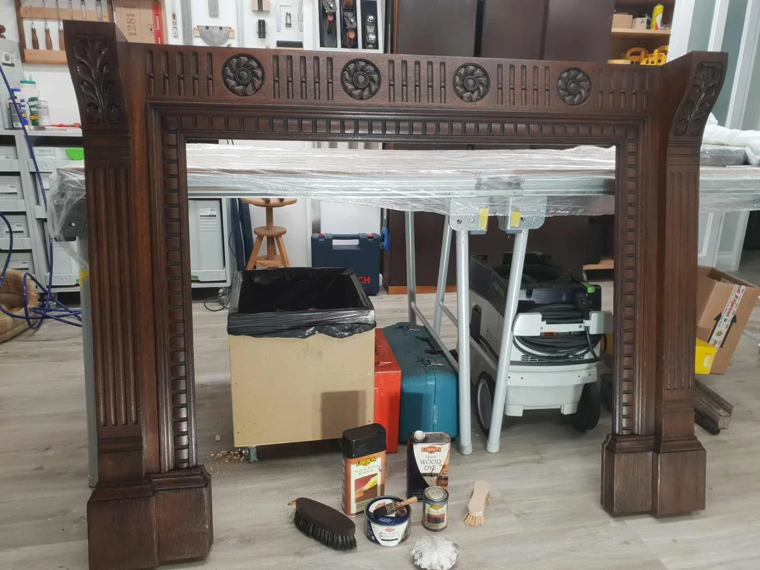Restored oak fireplace in workshop