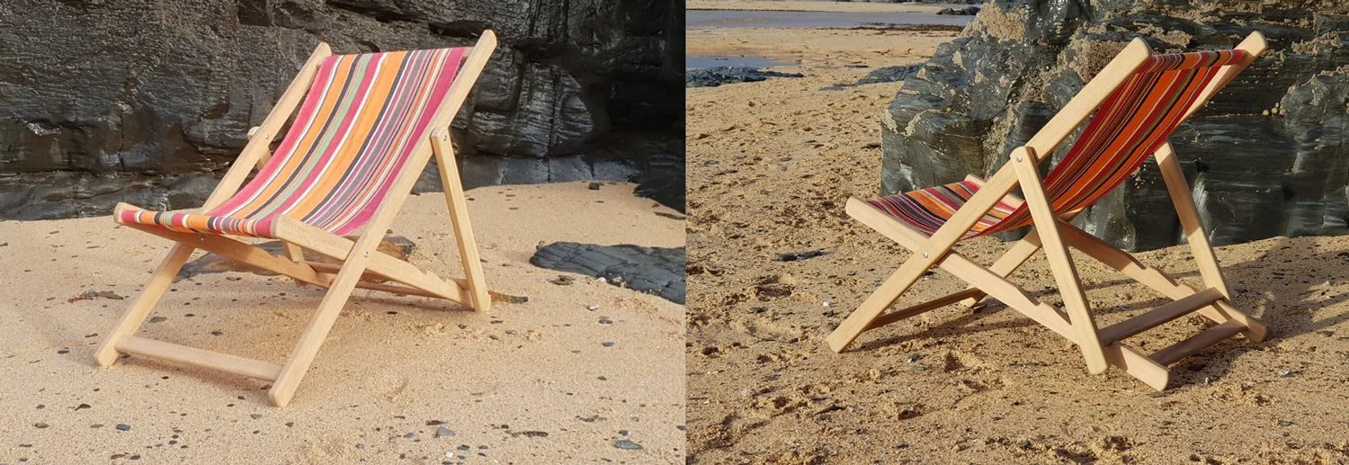 Front and back view of handmade wooden deckchair on a beach in Cornwall