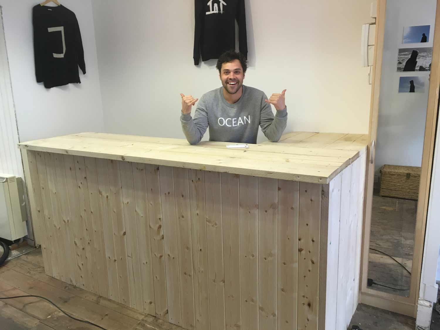 Andy leaning on the work-in-progress scaffold desk build