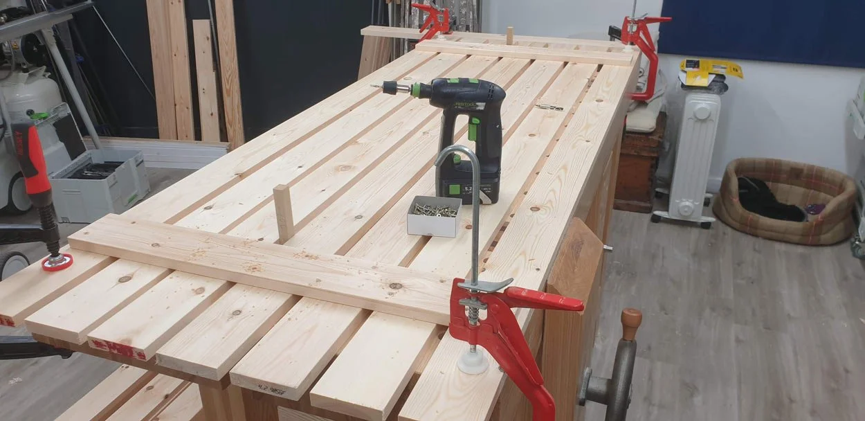 Constructing storage unit door in Cornwall summer house