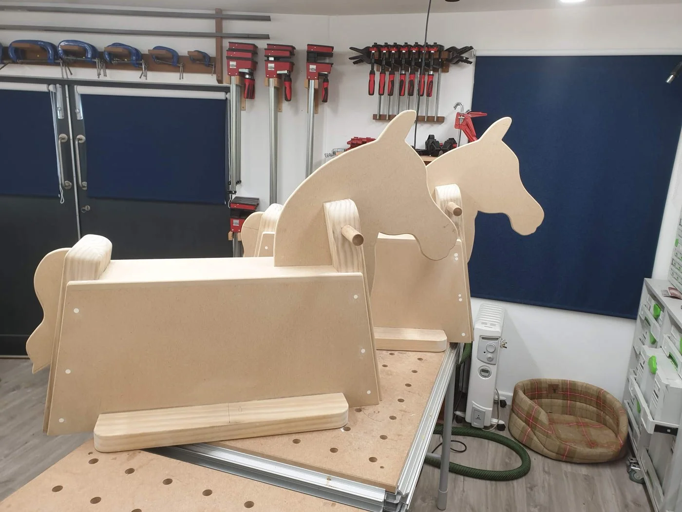 Two complete wooden rocking horses