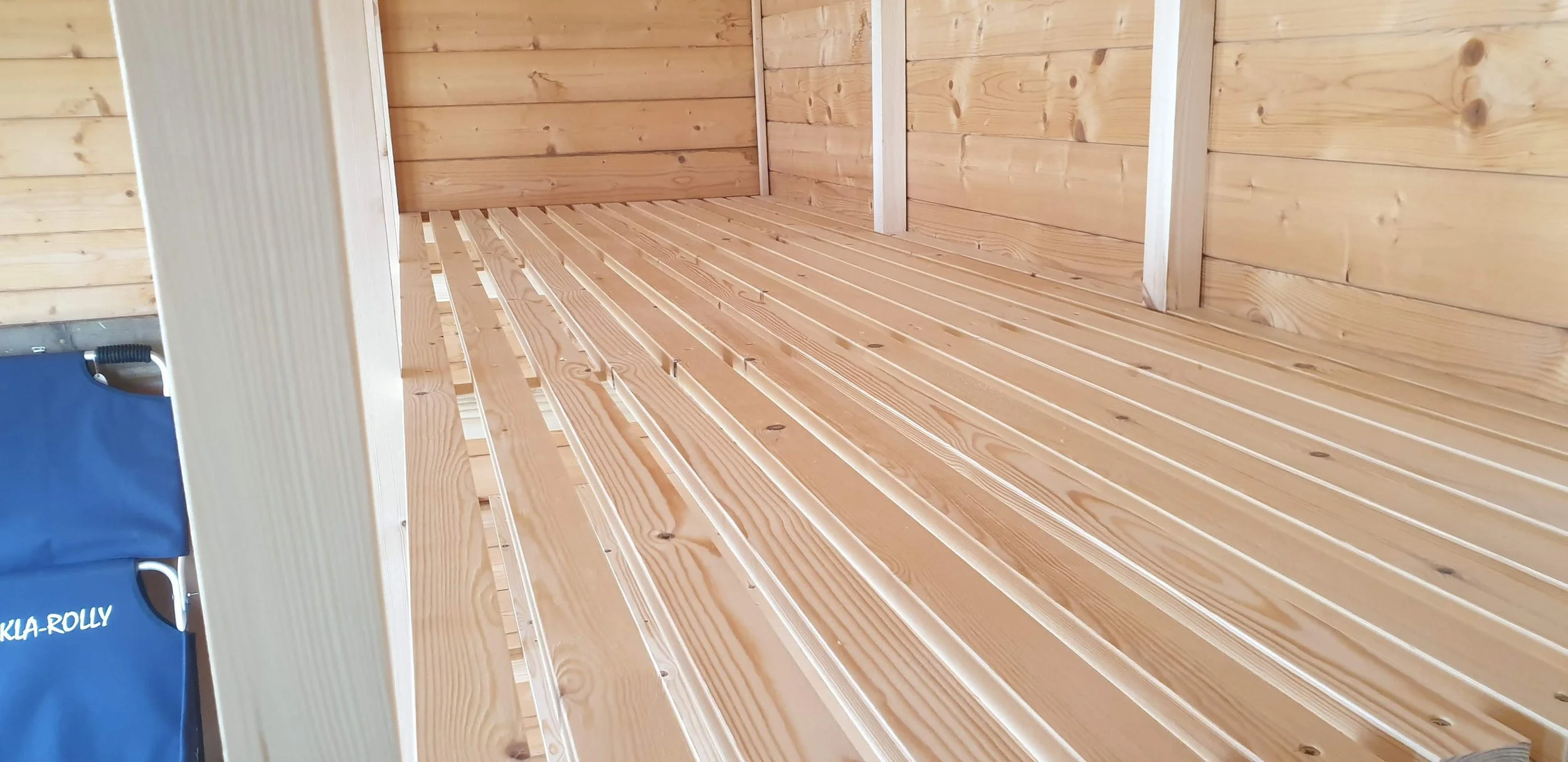 Slats in storage unit in Cornwall summer house