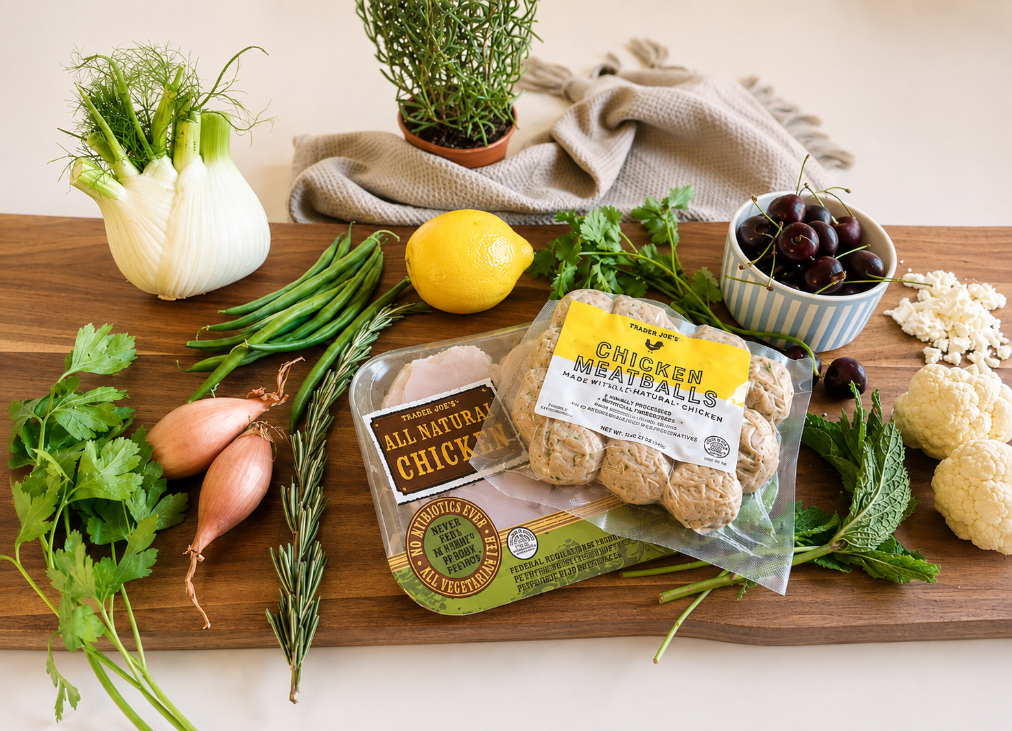 Rosemary and Cherry ingredients  arranged on a wooden board