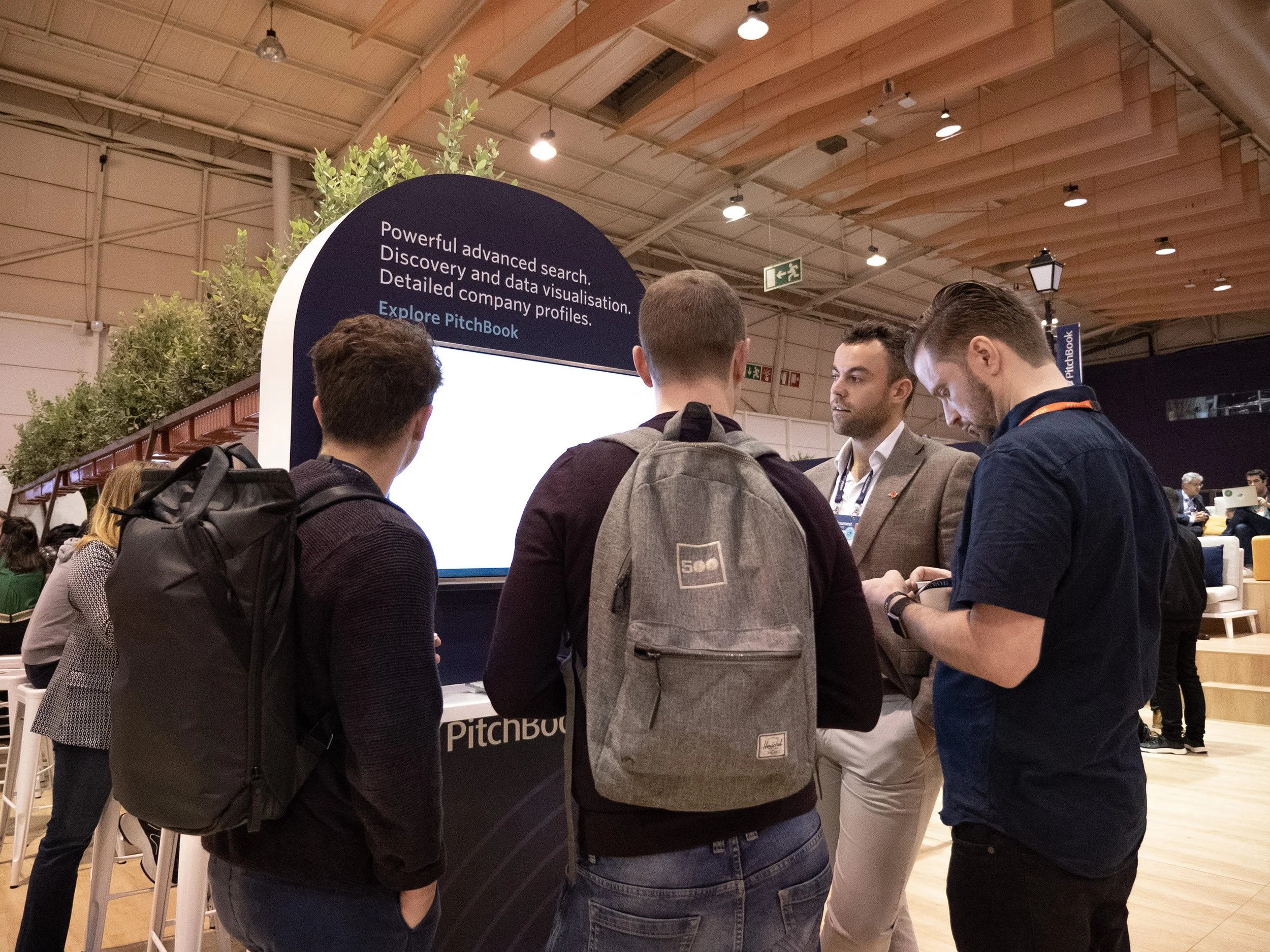 One of two kiosks inside the lounge for sales representatives to give demos of the PitchBook platform and answer questions