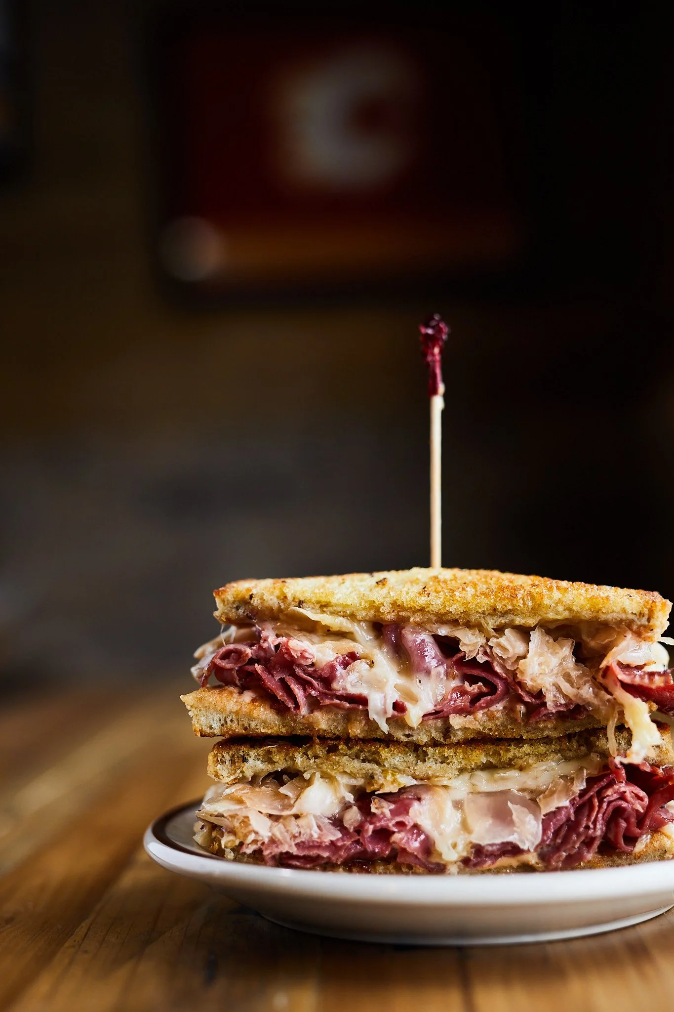 Side view of a stacked reuben sandwich