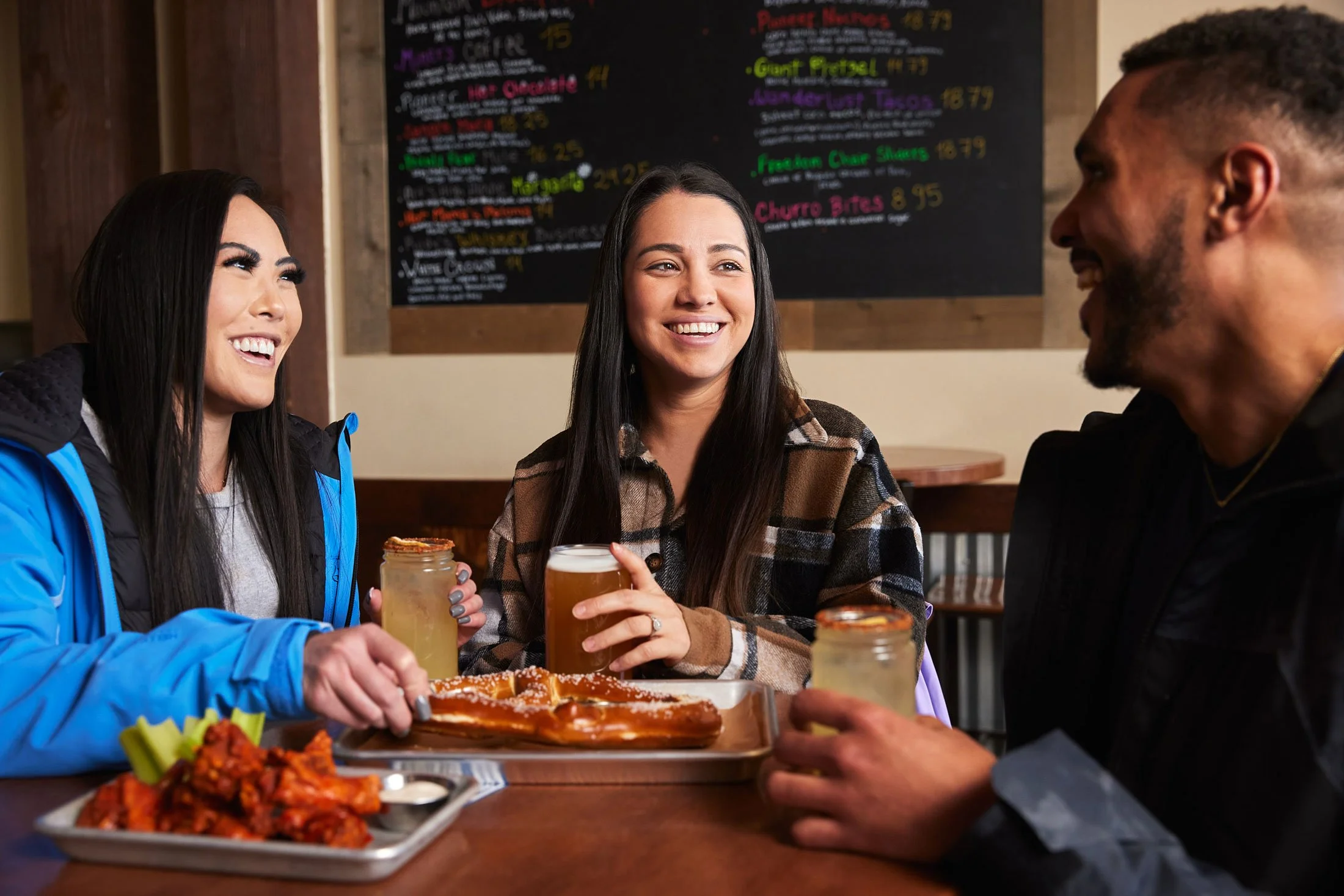 Skiers inside lodge having lunch and drinks in Breckenridge Colorado