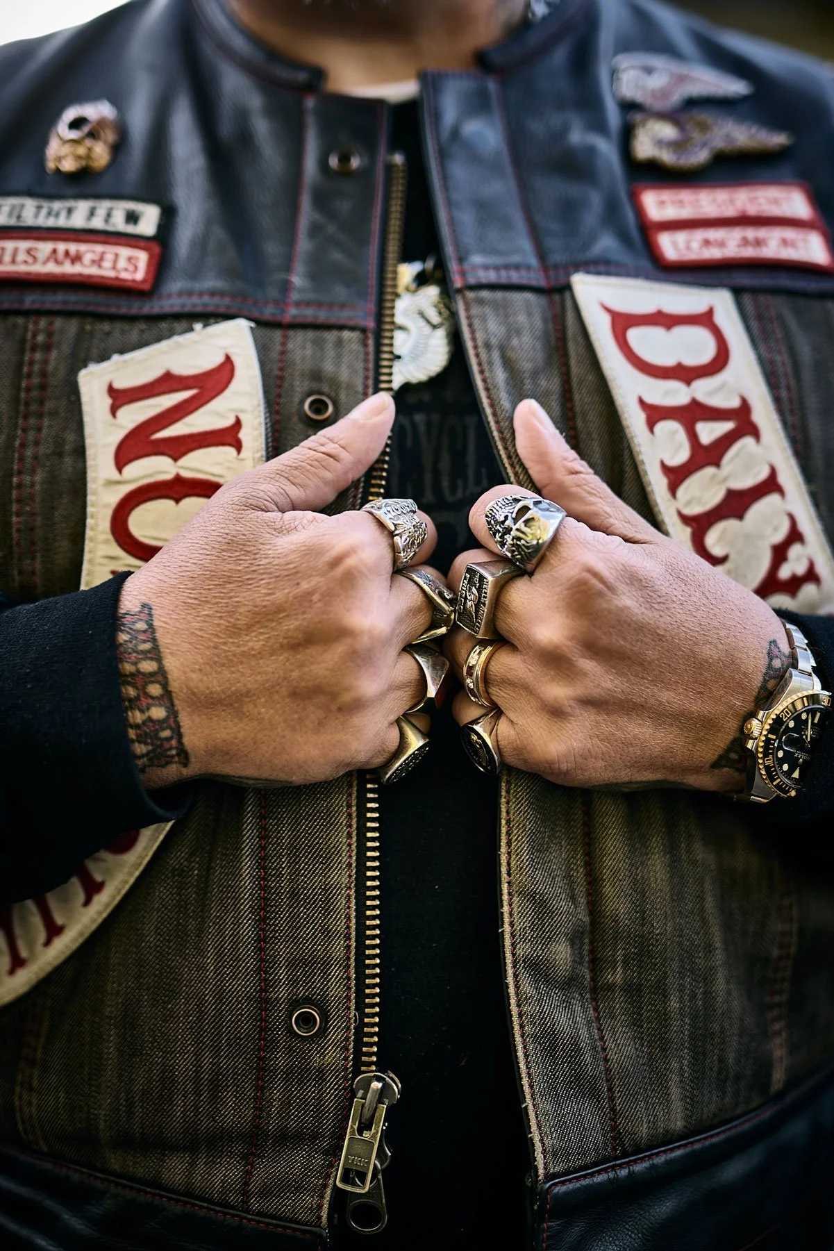 Longmont Hells Angels member clutching jacket