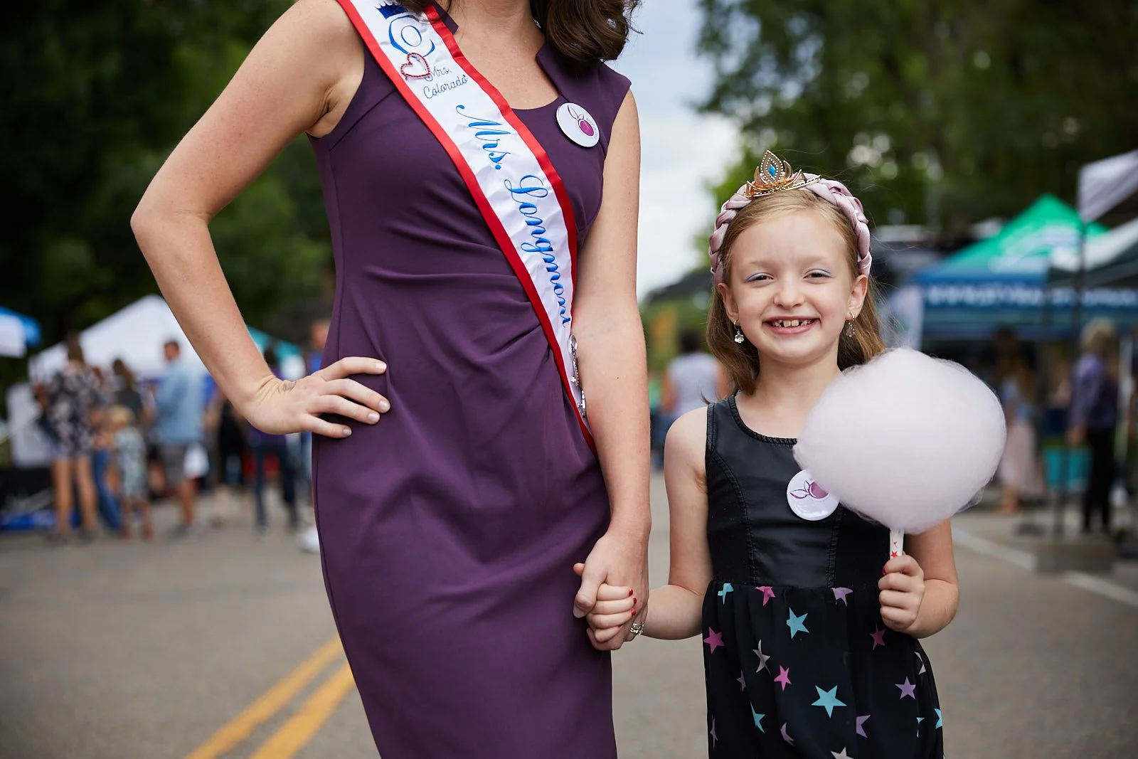 Mrs Longmont with her daughter holding cotton candy
