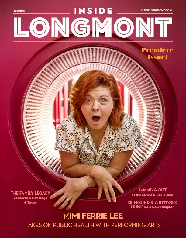 Woman in red tube slide on cover of Inside Longmont Magazine