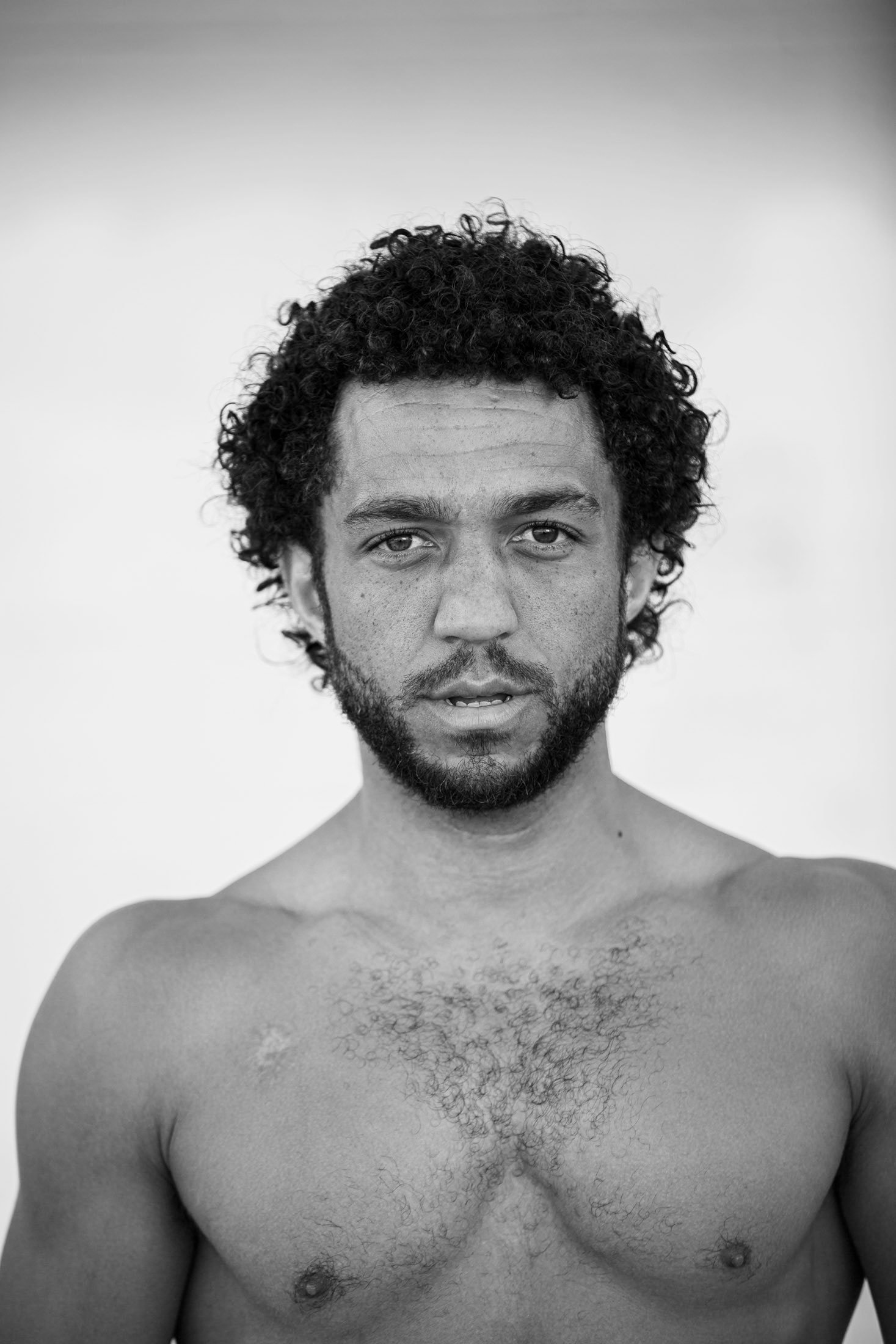 Personal trainer posing shirtless