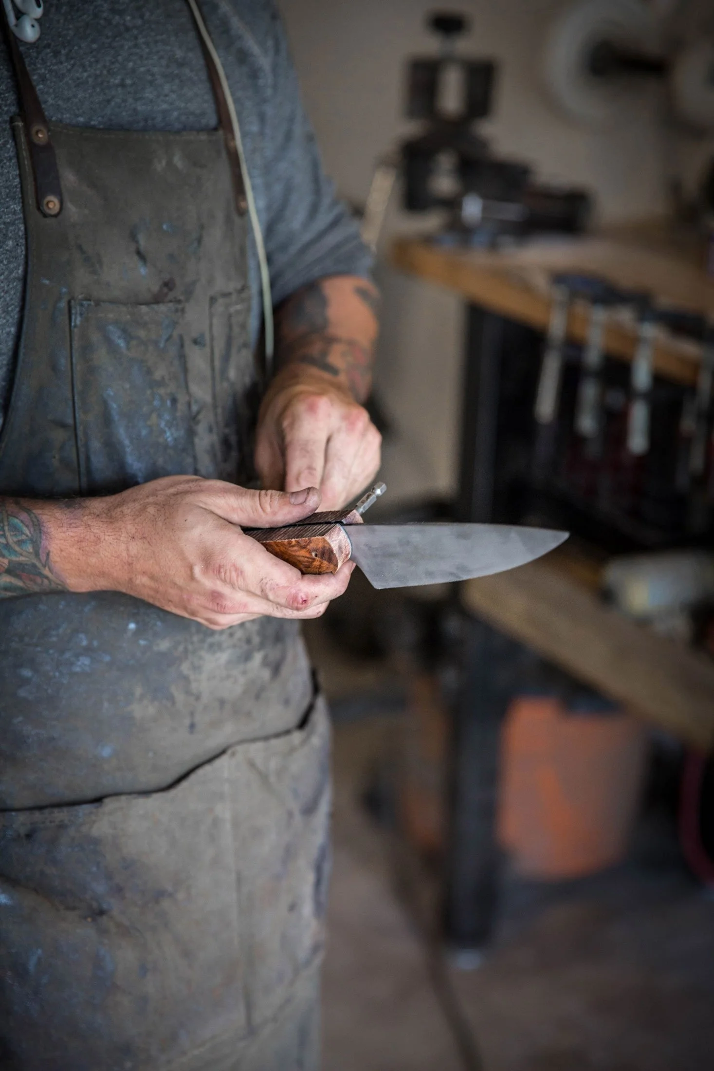 Knife maker assembling a knife handle