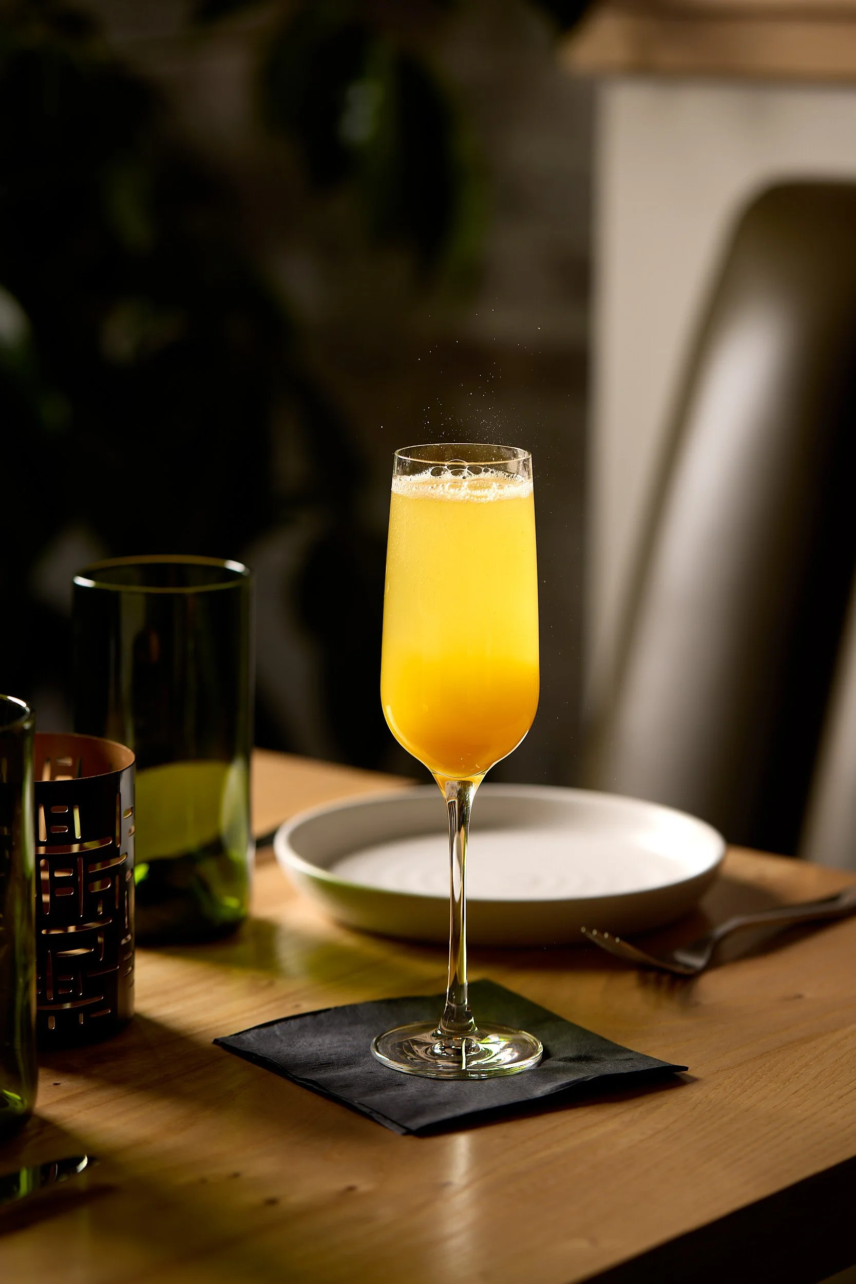 Mimosa on a table at Madre Cocina restaurant in Fort Collins