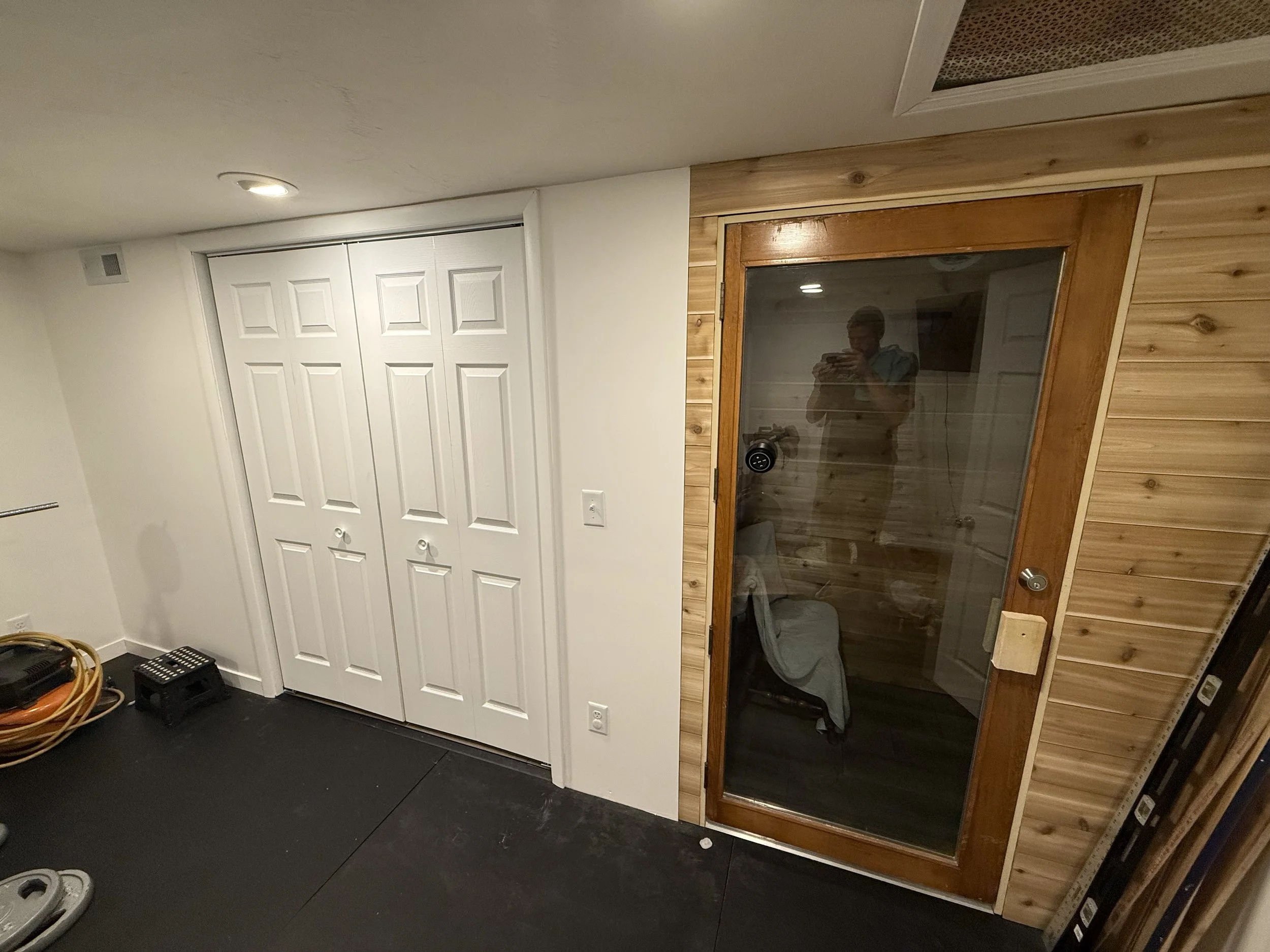 Added a built in Sauna to a basement workout room.