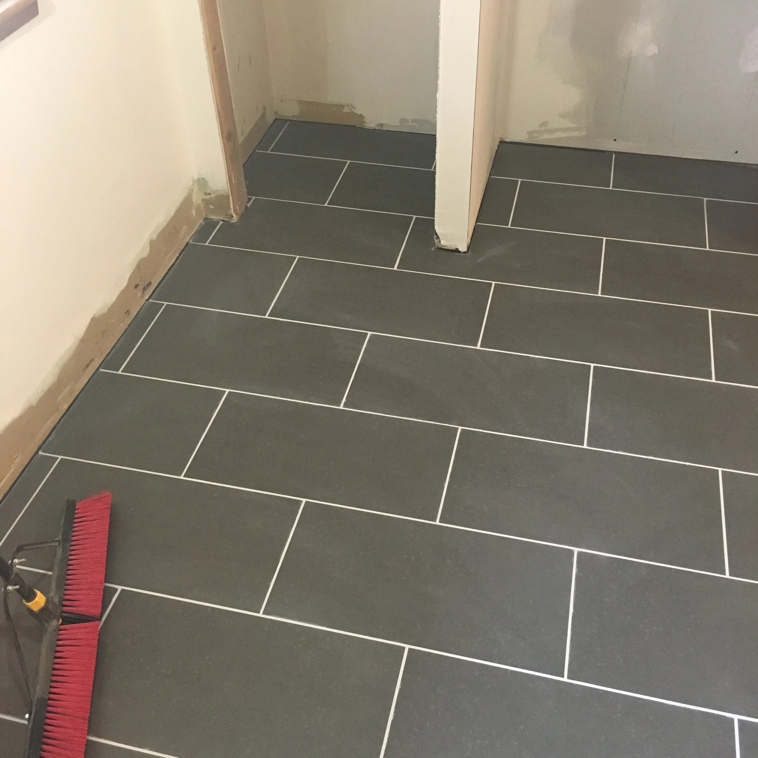 Turned a tired kitchen into a fresh one with new tile.