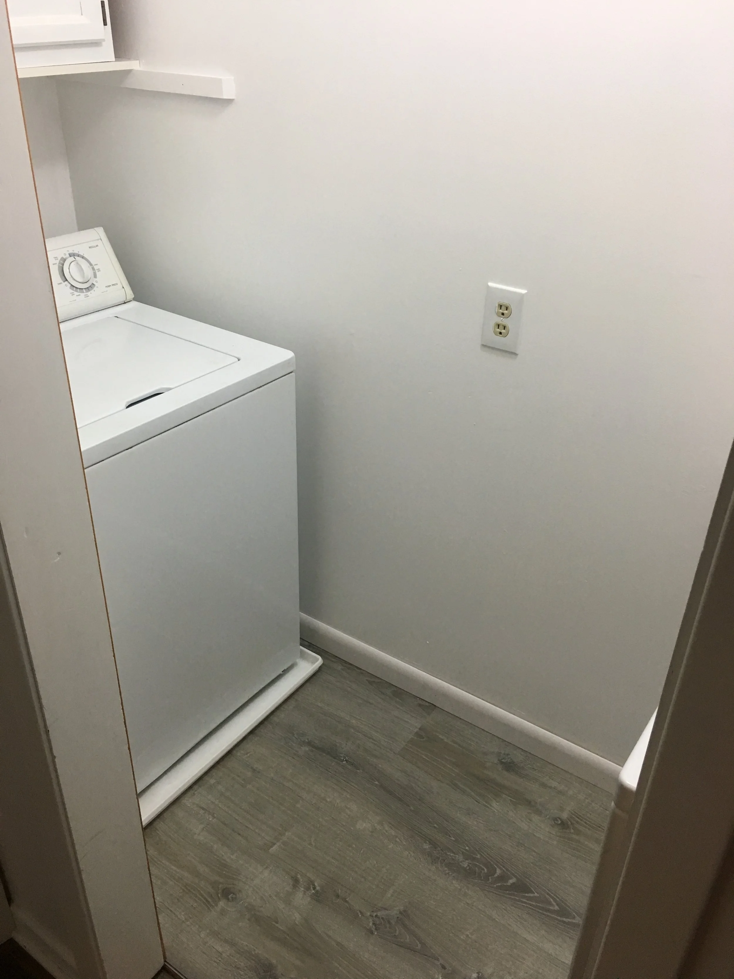 Took an old laundry room and made it a clean and useful space.
