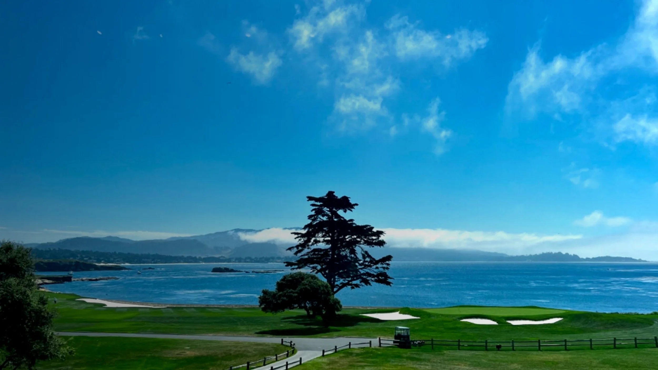 Pebble Beach 18th hole iconic golf course by the ocean California