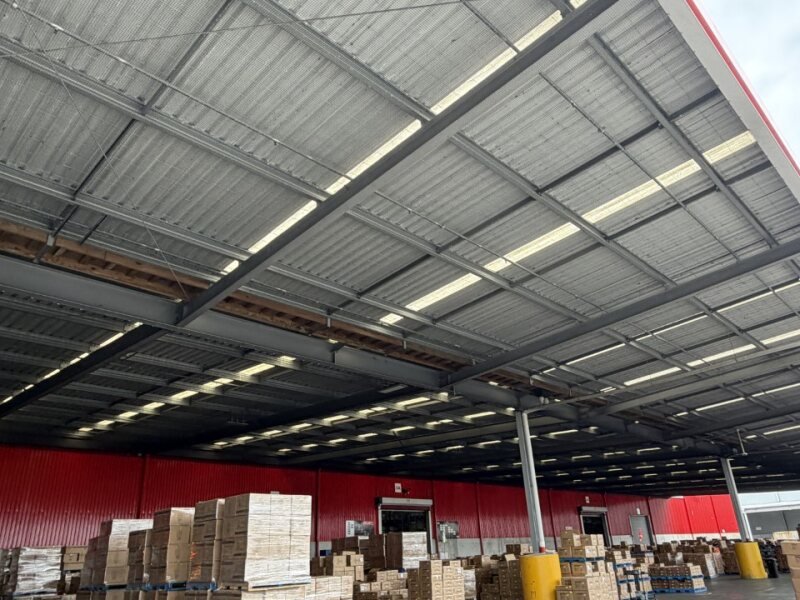 Inside a warehouse showing a warehouse canopy with bird netting. Bird proofing to stop birds.