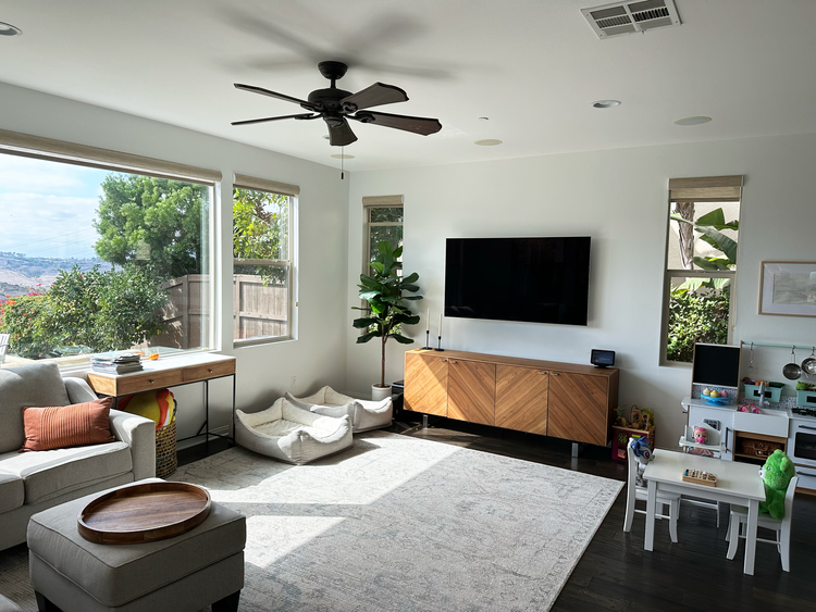 This customer wanted to do surround sound, but opted for a more affordable short term solution with a SONOS soundbar and flush mount rear speakers.