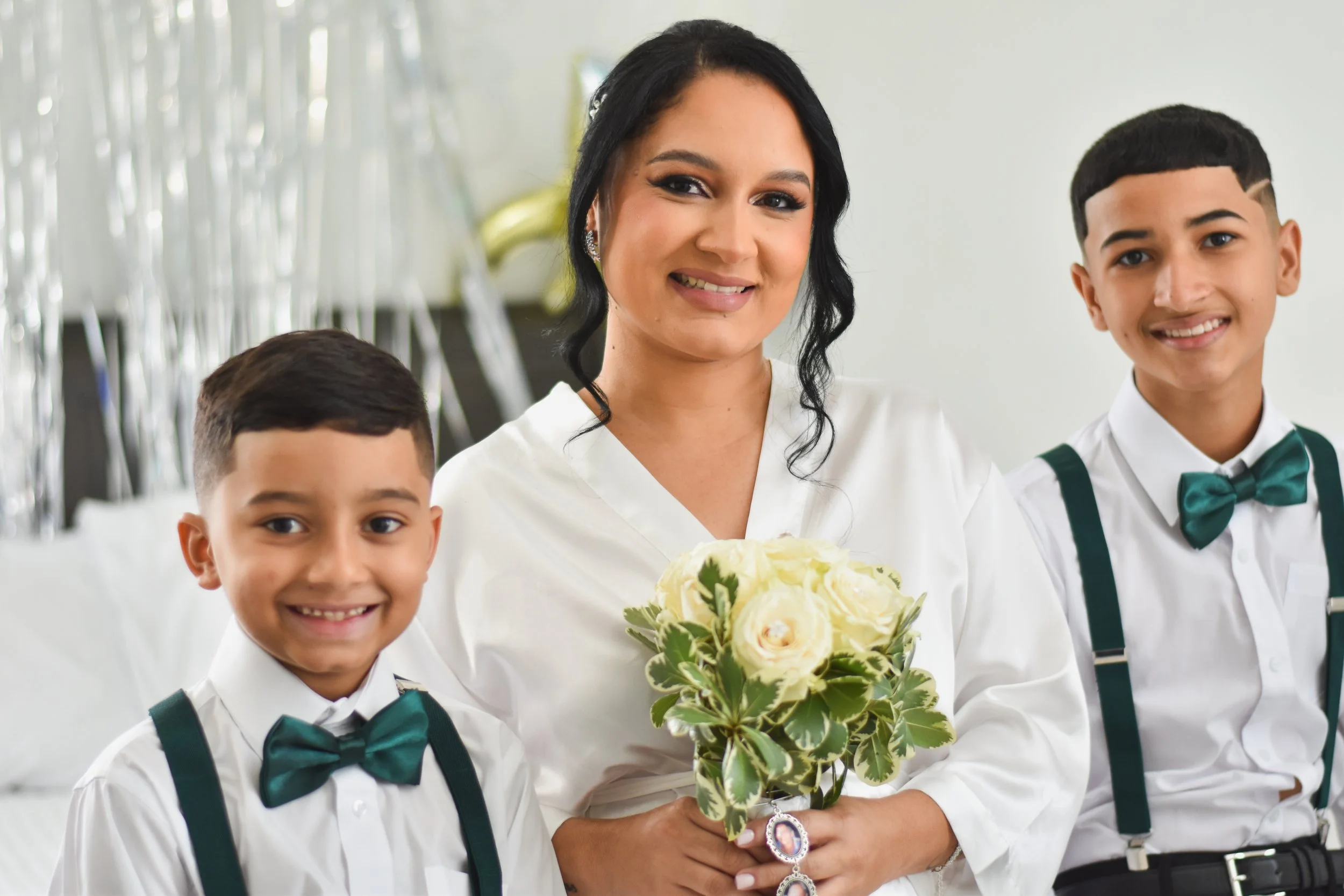 Bride preparation for her wedding with her sons