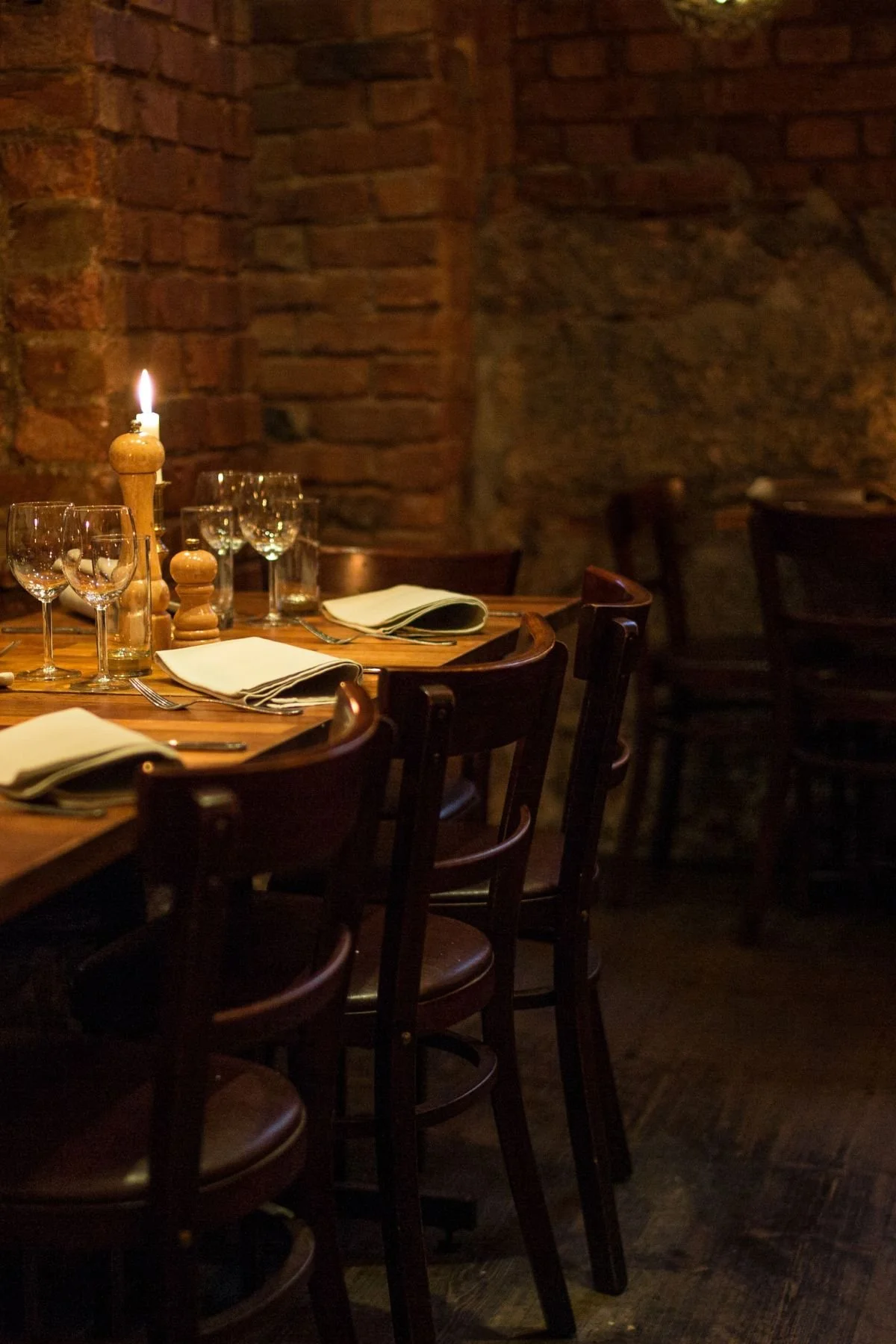 Warm candlelit restaurant dining room