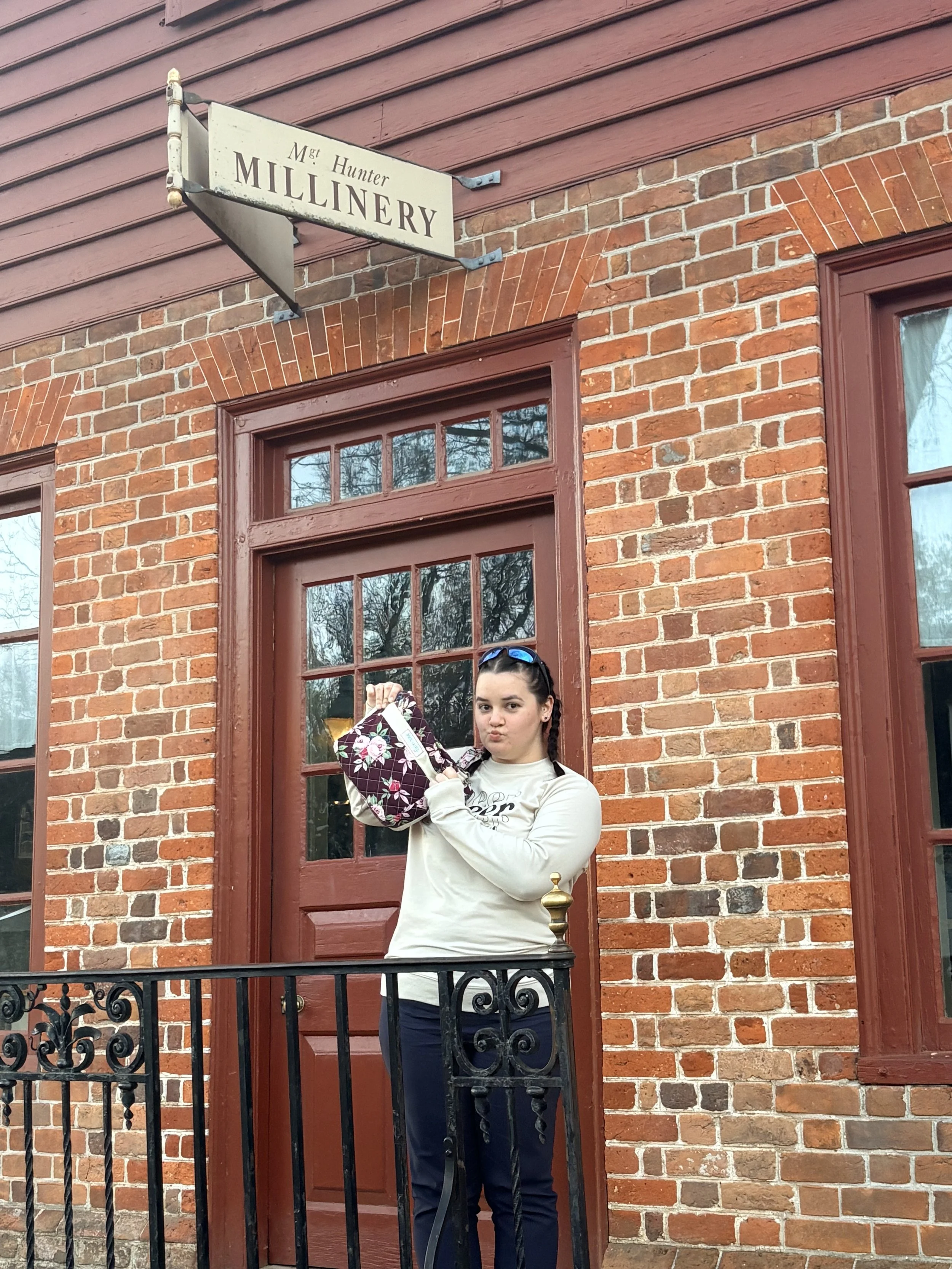 Posing with my custom bag in front of a 1700s Millinery (ladies accessory and bag maker)