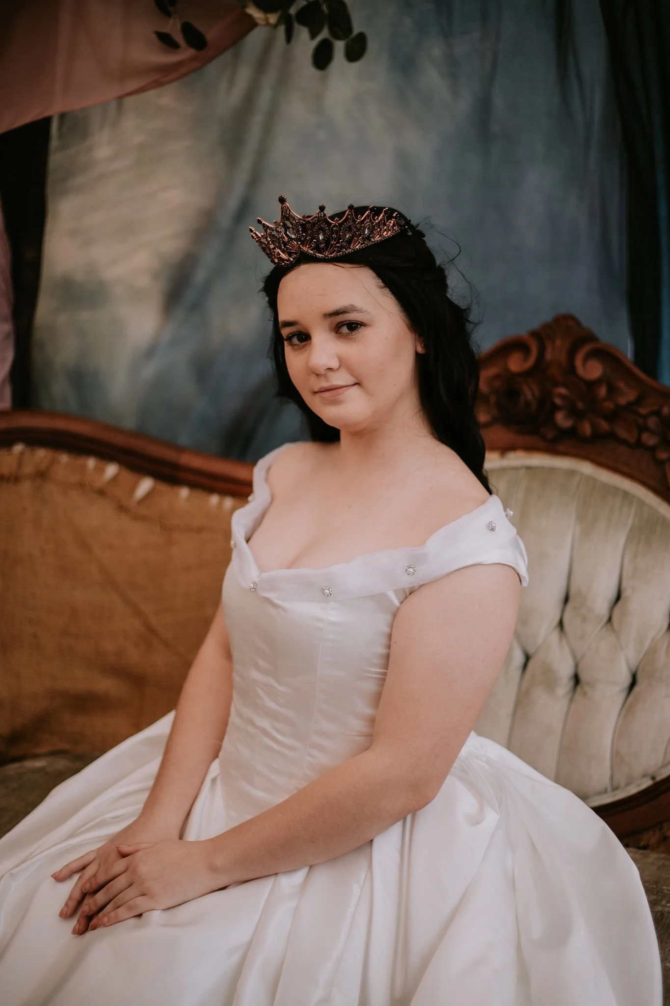 Original character's attire: Wedding gown, corset back closure, pedicoast and other historical features.