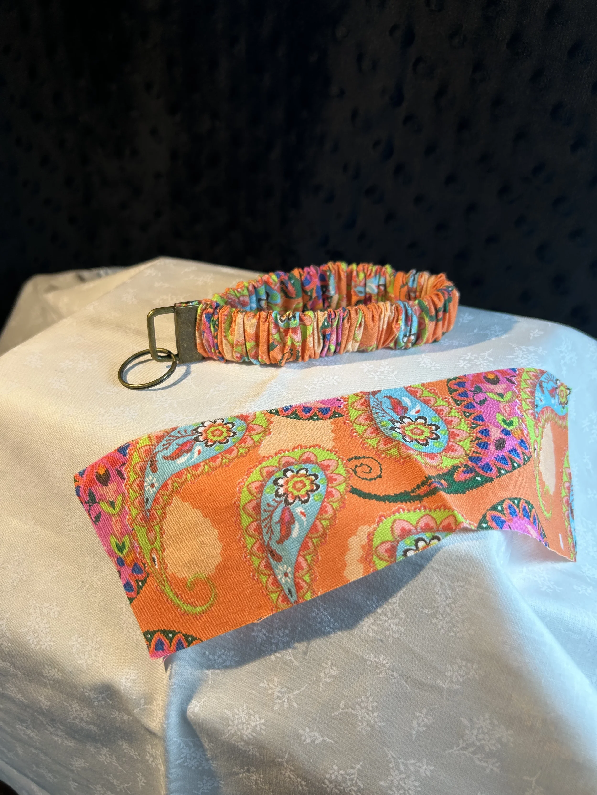 Orange Paisley scrunchie keyfob.webp