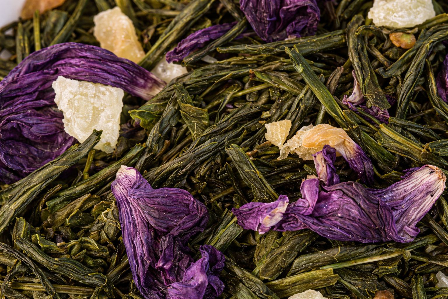 Pineapple Papaya green tea loose leaf tea blend showing dried fruit and green tea leaves