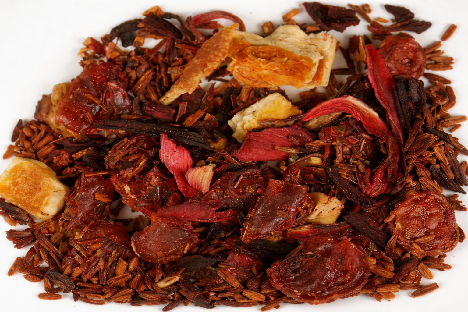 Merry and Bright Tea loose leaf herbal fruit tea blend showing dried fruit and hibiscus