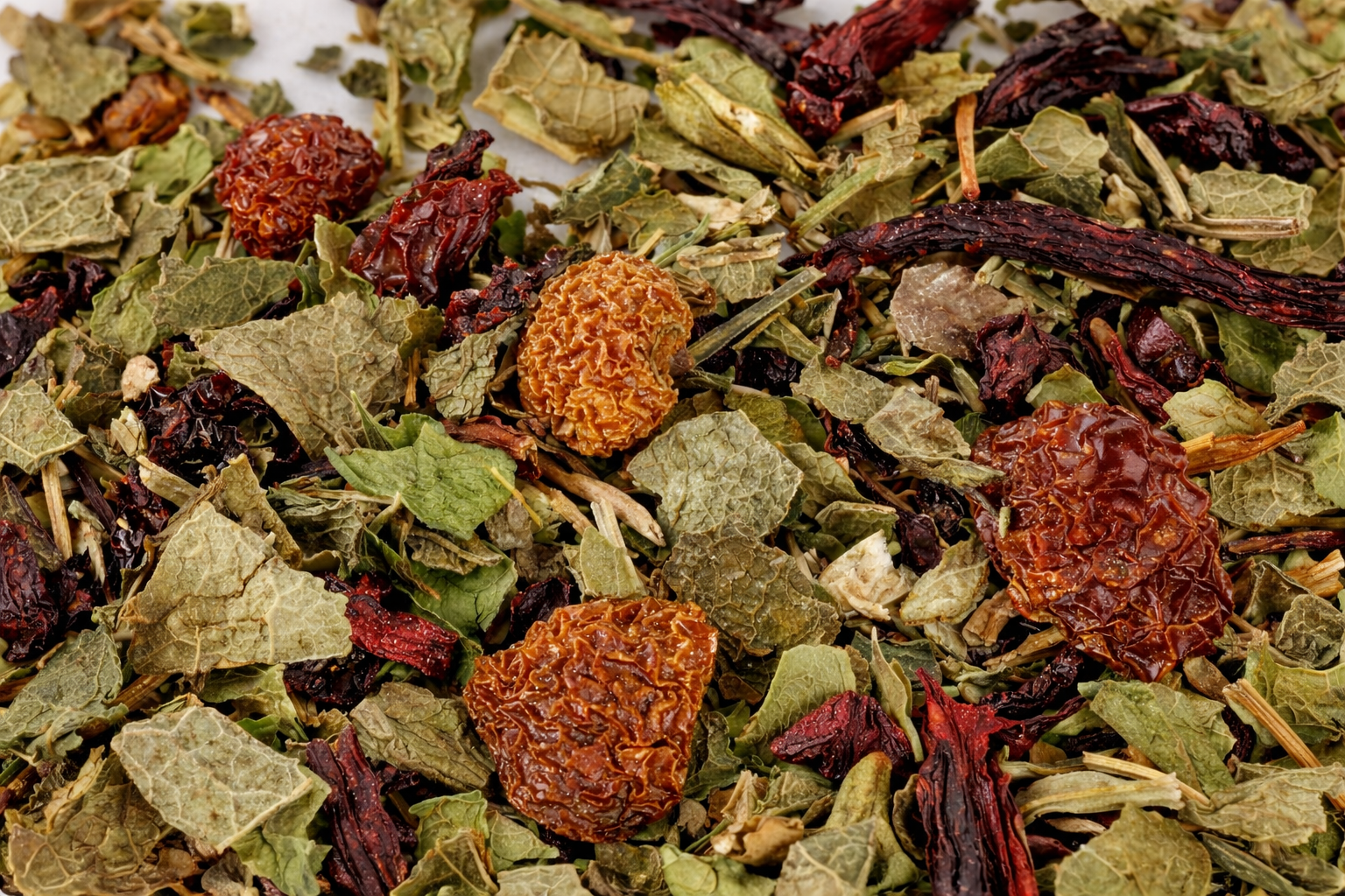 Juniper Juice Up herbal loose leaf tea blend showing dried berries and herbs