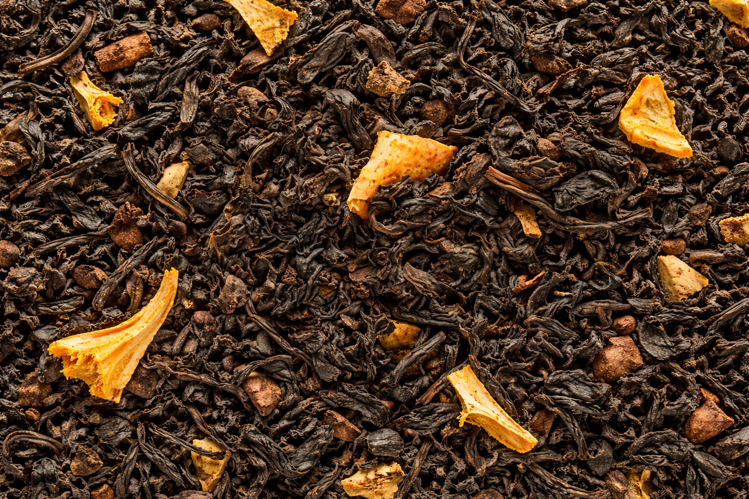 Spiced Orange Black Tea loose leaf tea showing orange peel and cinnamon pieces