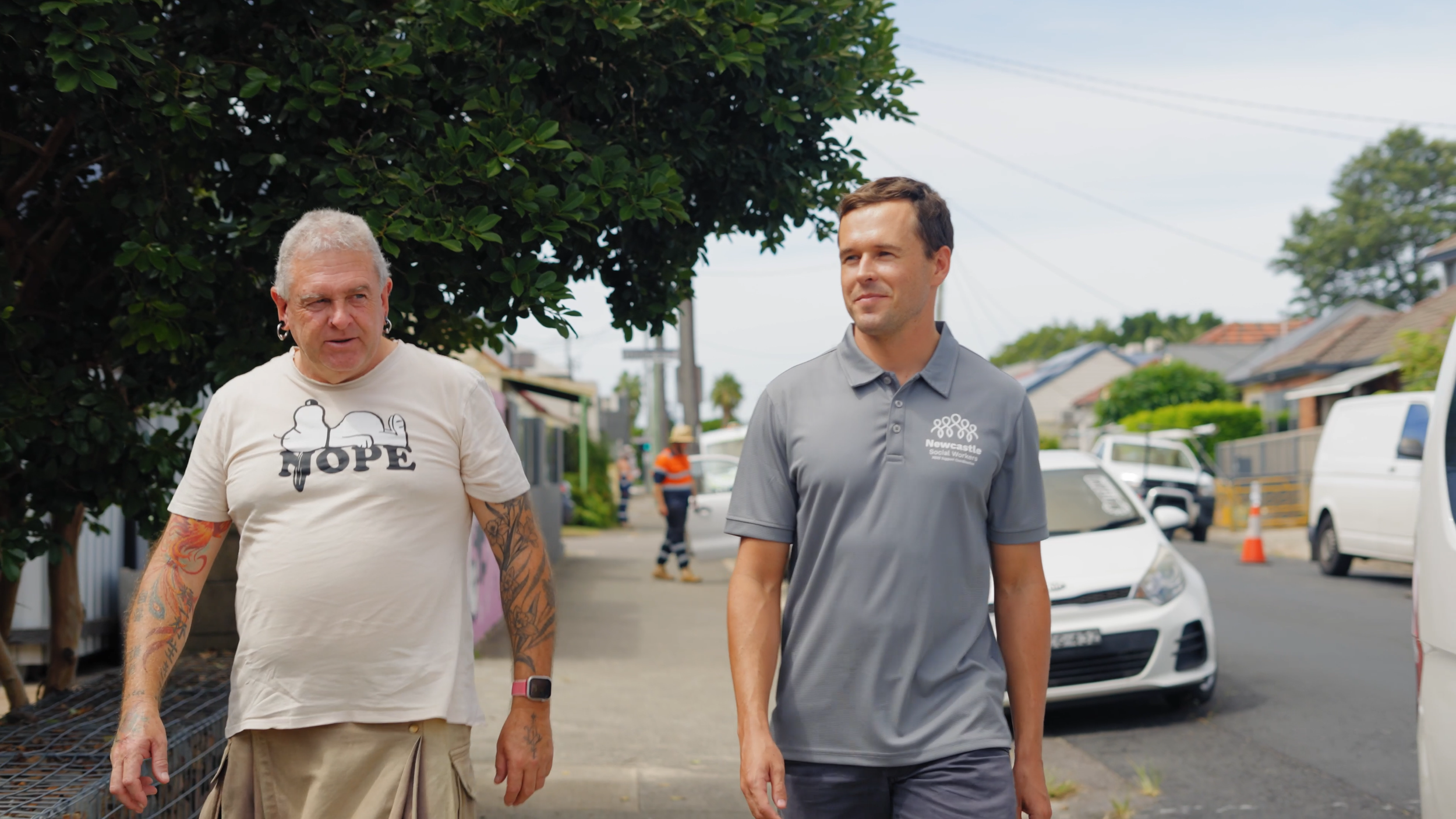 Kurt from Newcastle Social Workers walking with an NDIS participant in the local community, reflecting person-centred support coordination in Newcastle.