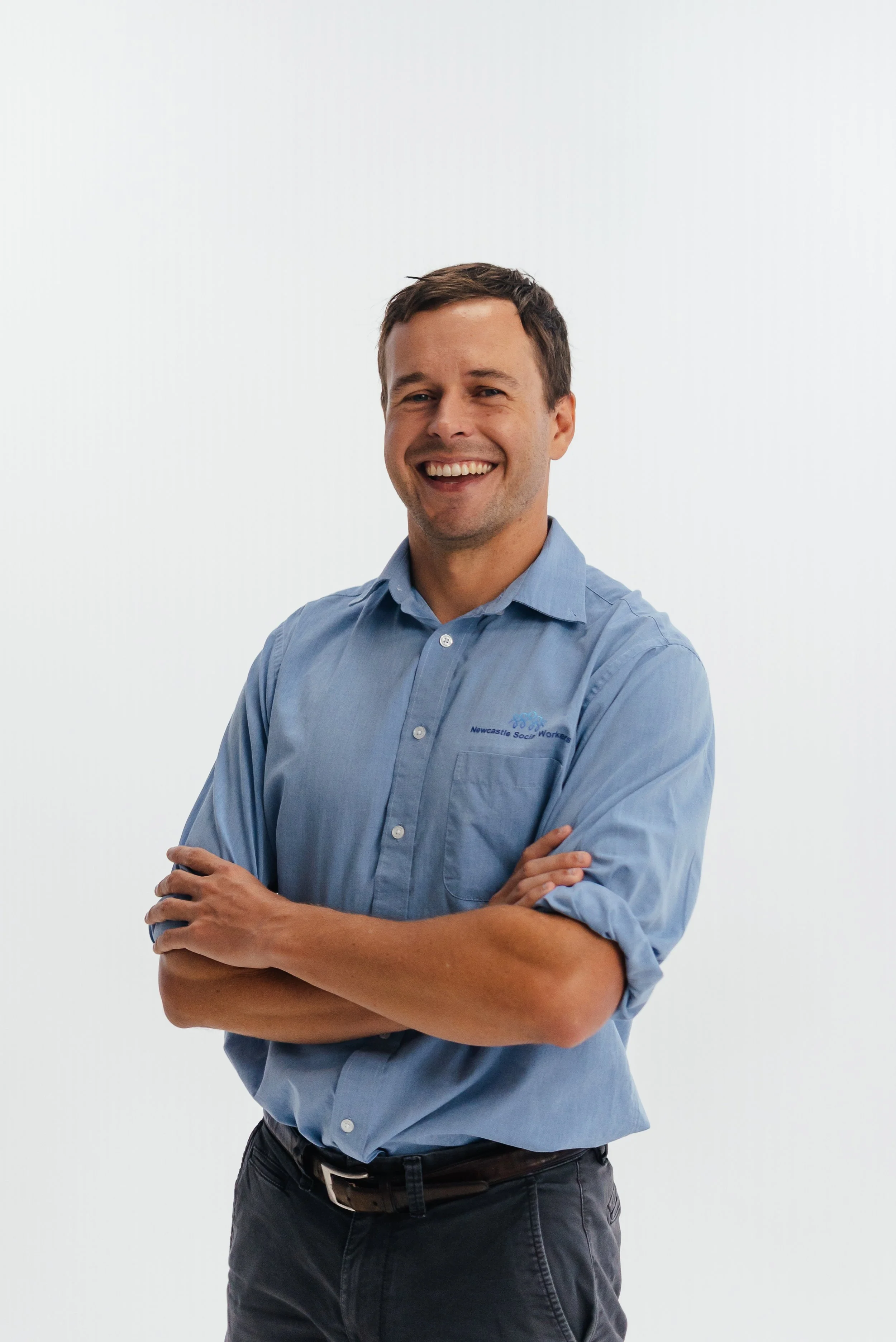Kurt, Director of  Newcastle Social Workers shown in his staff bio photo for the local NDIS support coordination team in Newcastle.