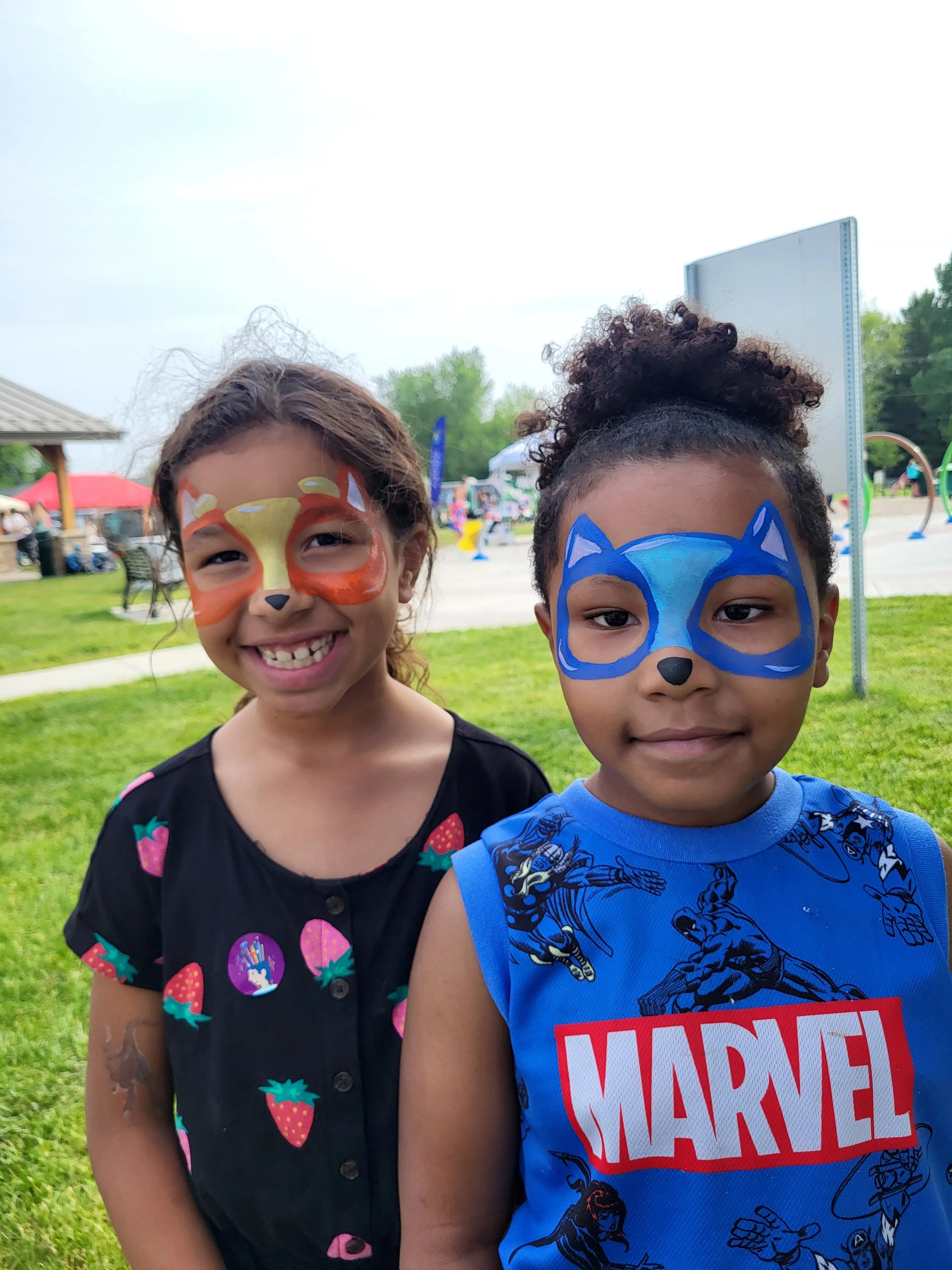 bluey and bingo face painting at birthday party verona wisconsin