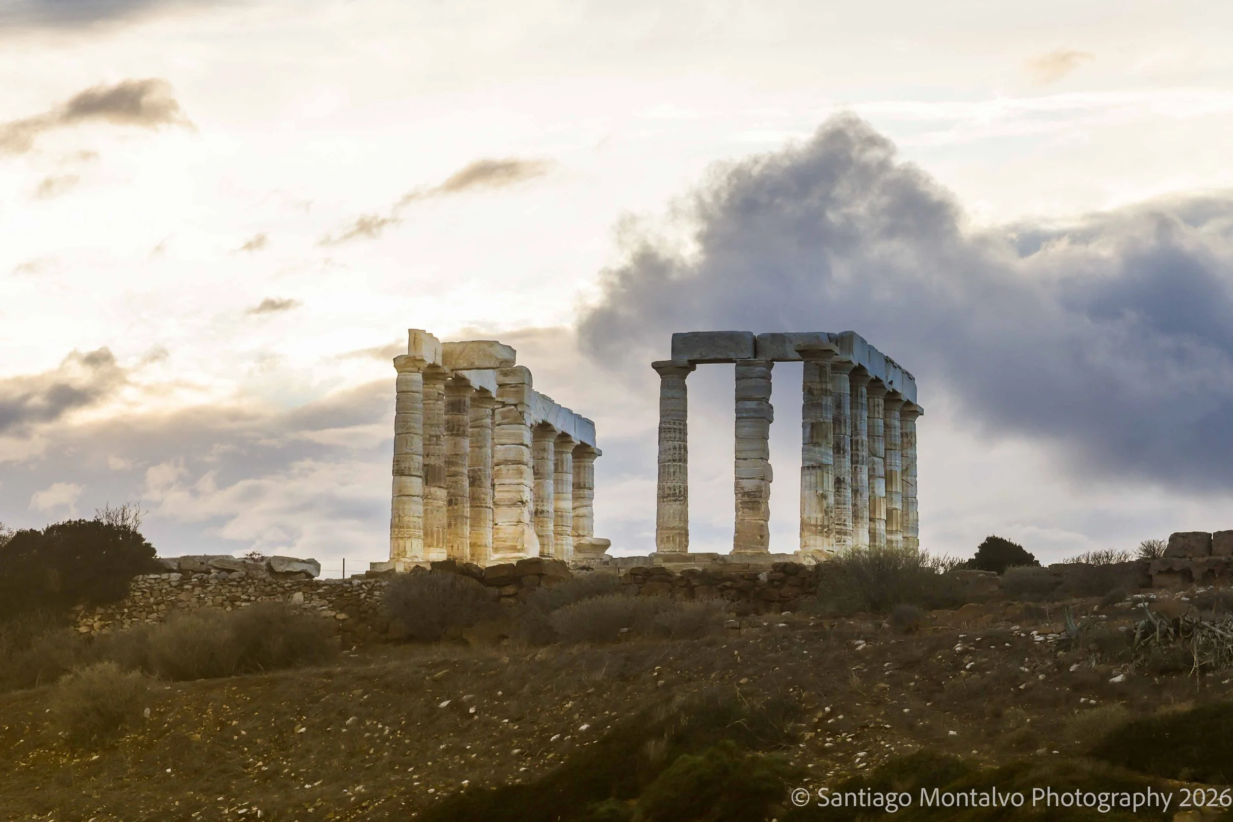 Columns Against the Sky — Cape Sounion, Greece. Classical architecture meets dramatic clouds and beautiful Mediterranean light.
