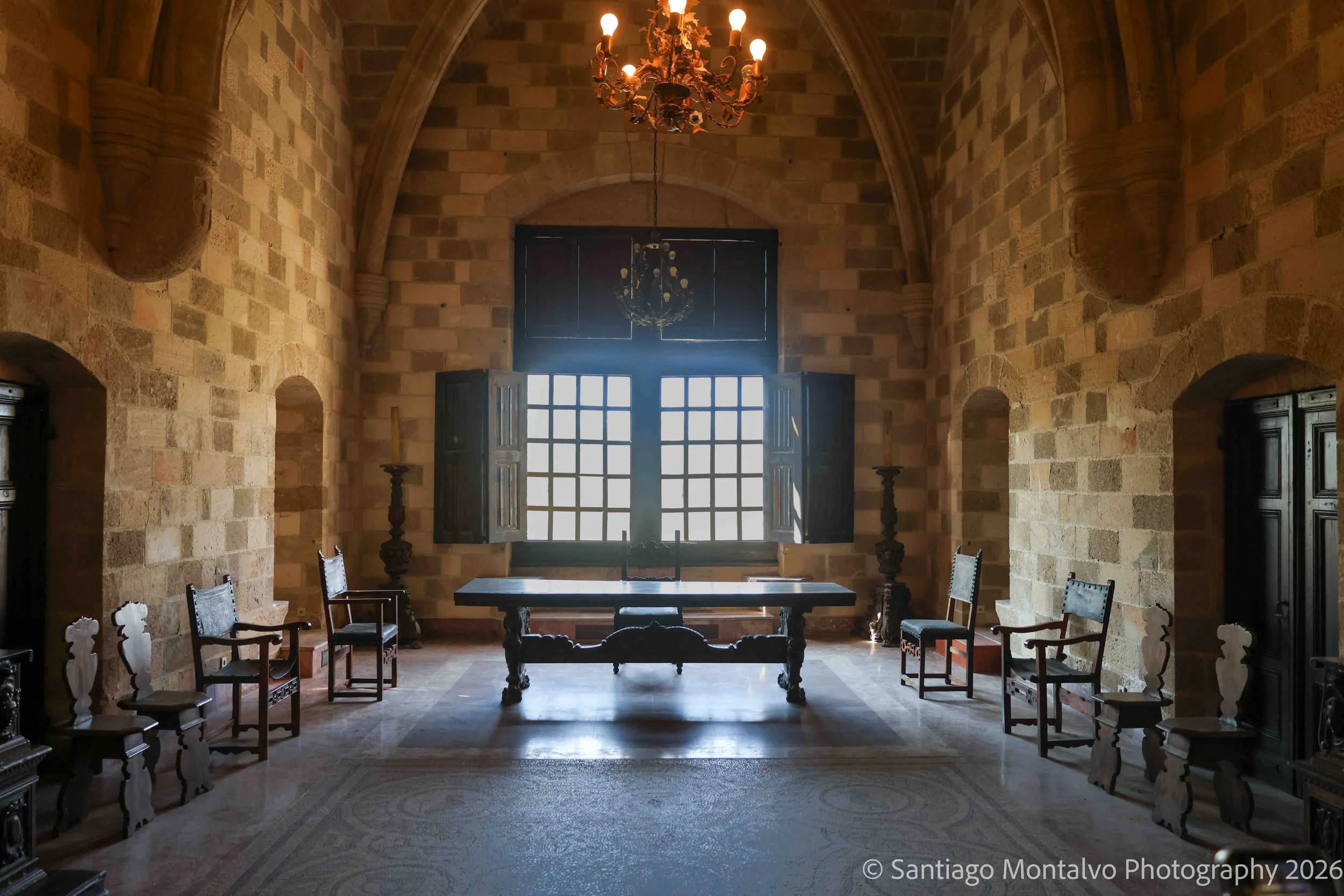 A Room of Light — Rhodes, Greece. Warm stone, gentle light, and the quiet elegance of historic architecture.