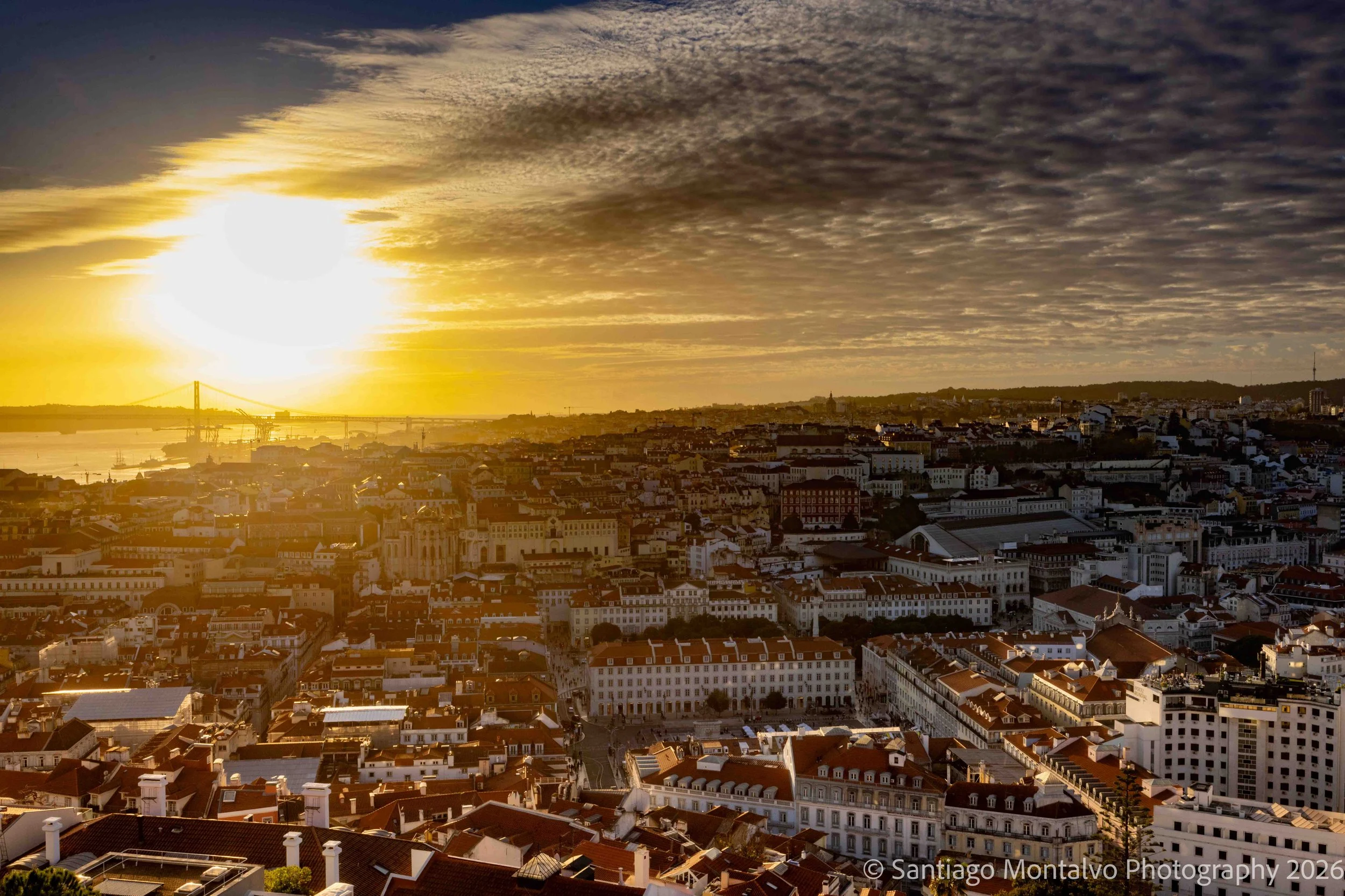 A City at Sunset — Lisbon, Portugal. A panoramic view transformed by the warmth of the setting sun.
