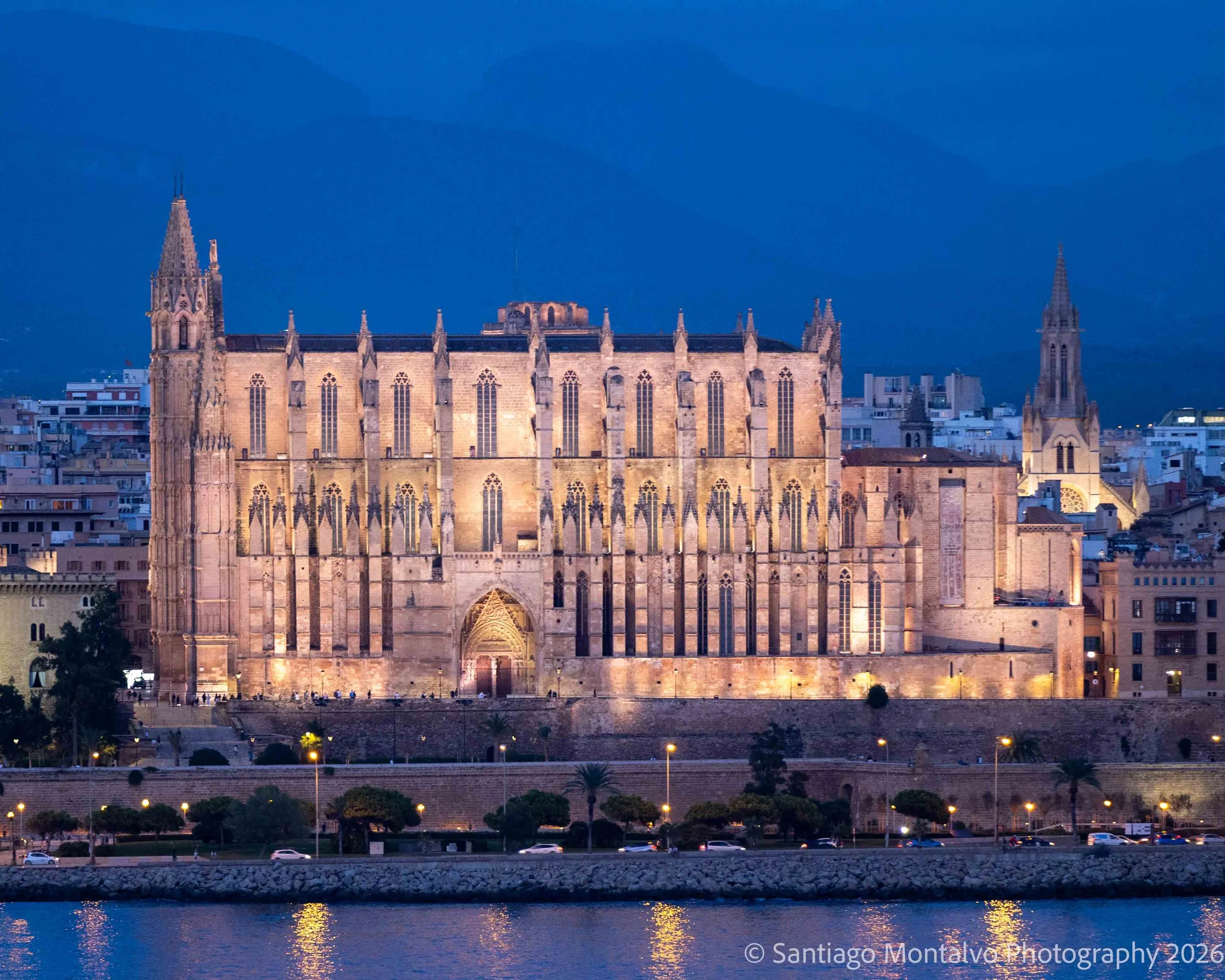 Cathedral After Dark — Palma de Mallorca, Spain. A magnificent cathedral glows against the evening sky.
