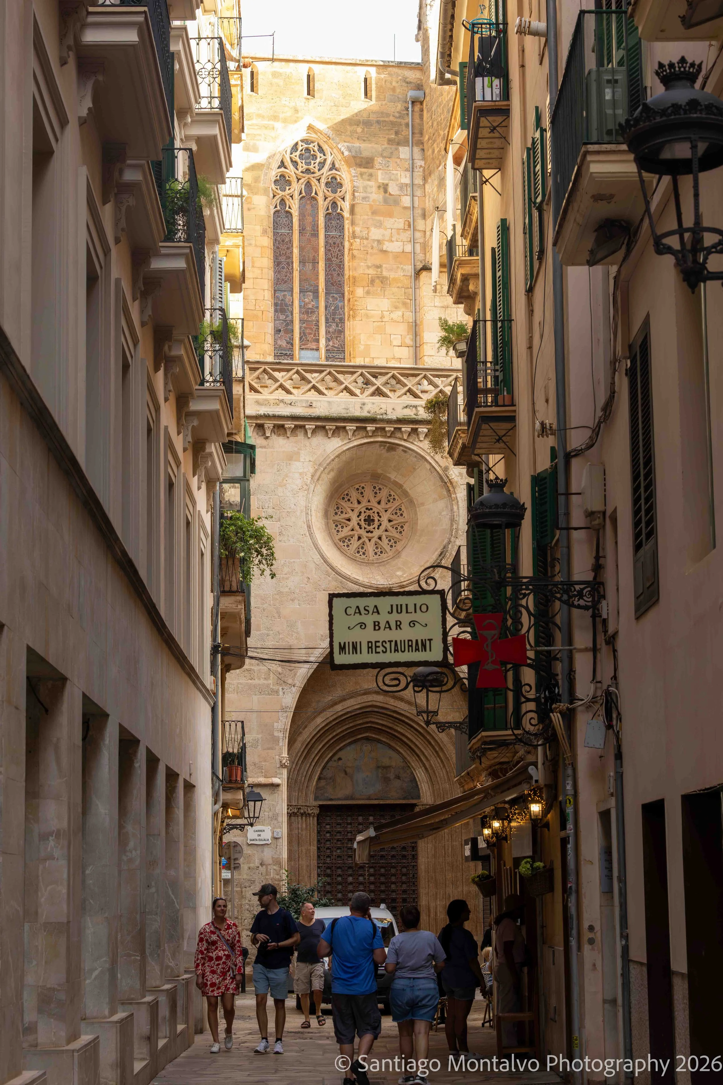 Through the Old Quarter — Palma de Mallorca, Spain. A narrow passage reveals the layered architectural character of this Mediterranean city.