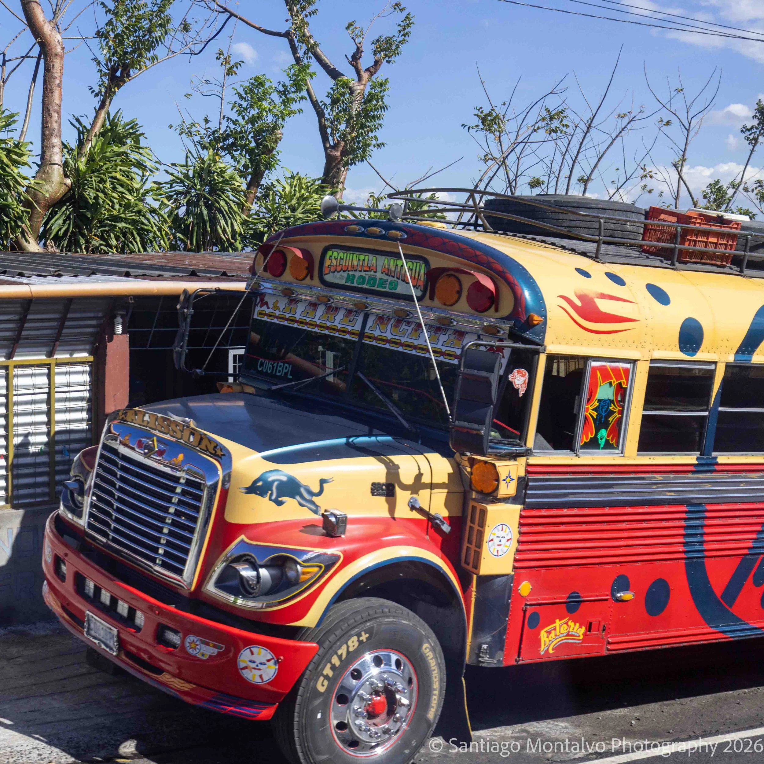 A Journey in Color — Guatemala. A brightly decorated traditional bus reflects the artistry and personality of everyday transportation.