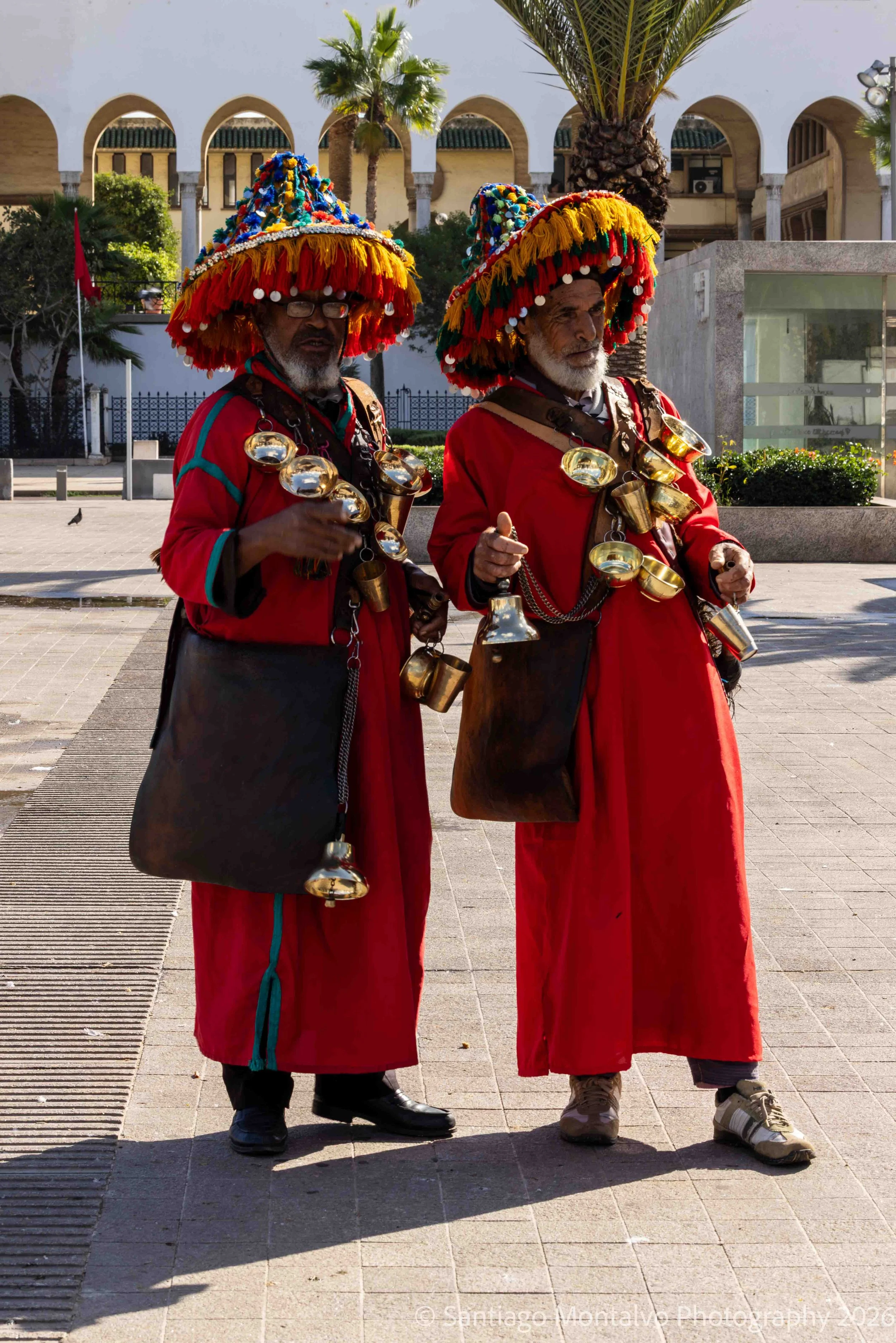 Keepers of Tradition — Casablanca, Morocco. Traditional water sellers in colorful attire embody a distinctive part of Moroccan cultural heritage.
