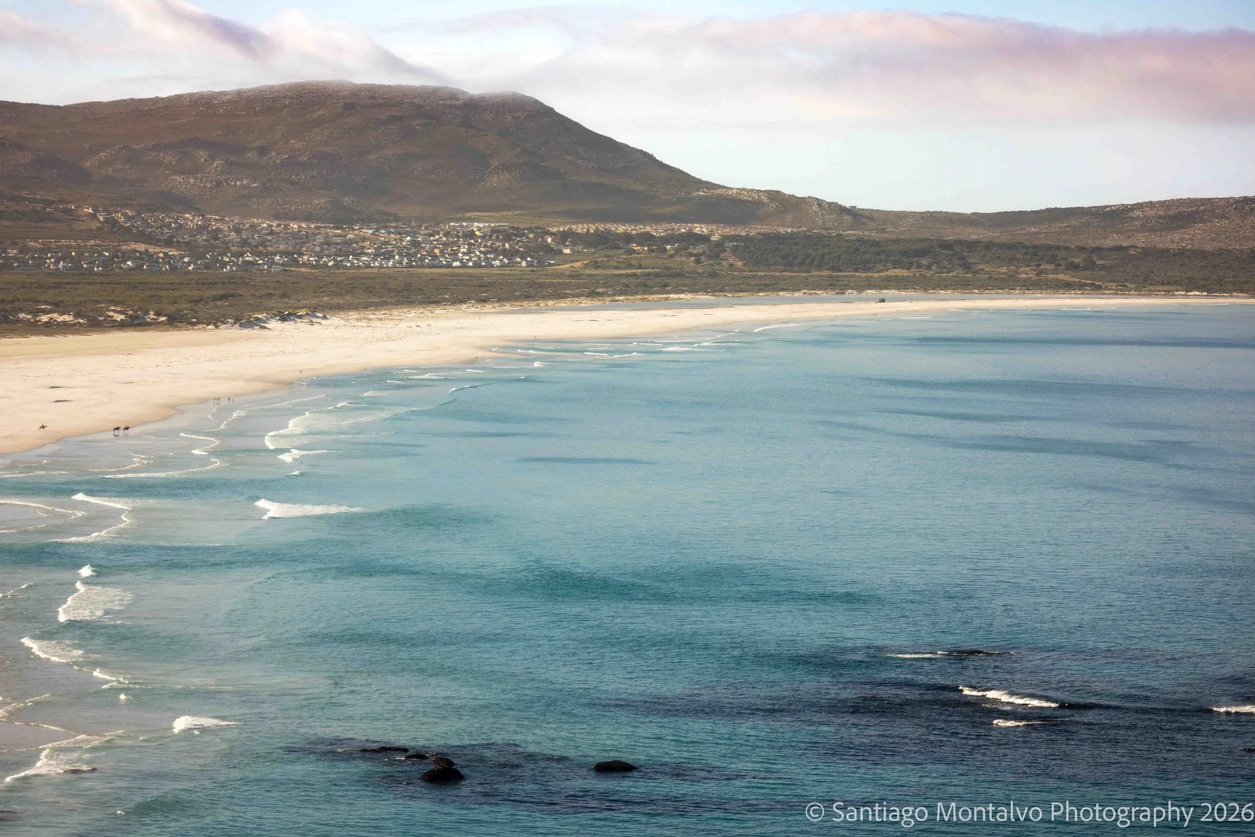 Where Ocean Meets Land — South Africa. Turquoise waters and rugged coastline in beautiful natural harmony.