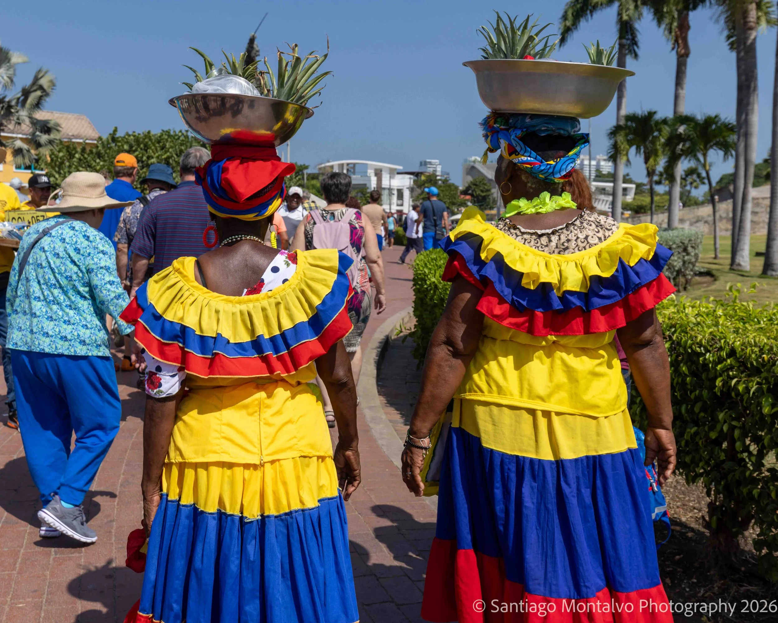 A Celebration of Tradition — Cartagena, Colombia. Traditional dress and vivid colors reflect the cultural richness of the Caribbean coast.