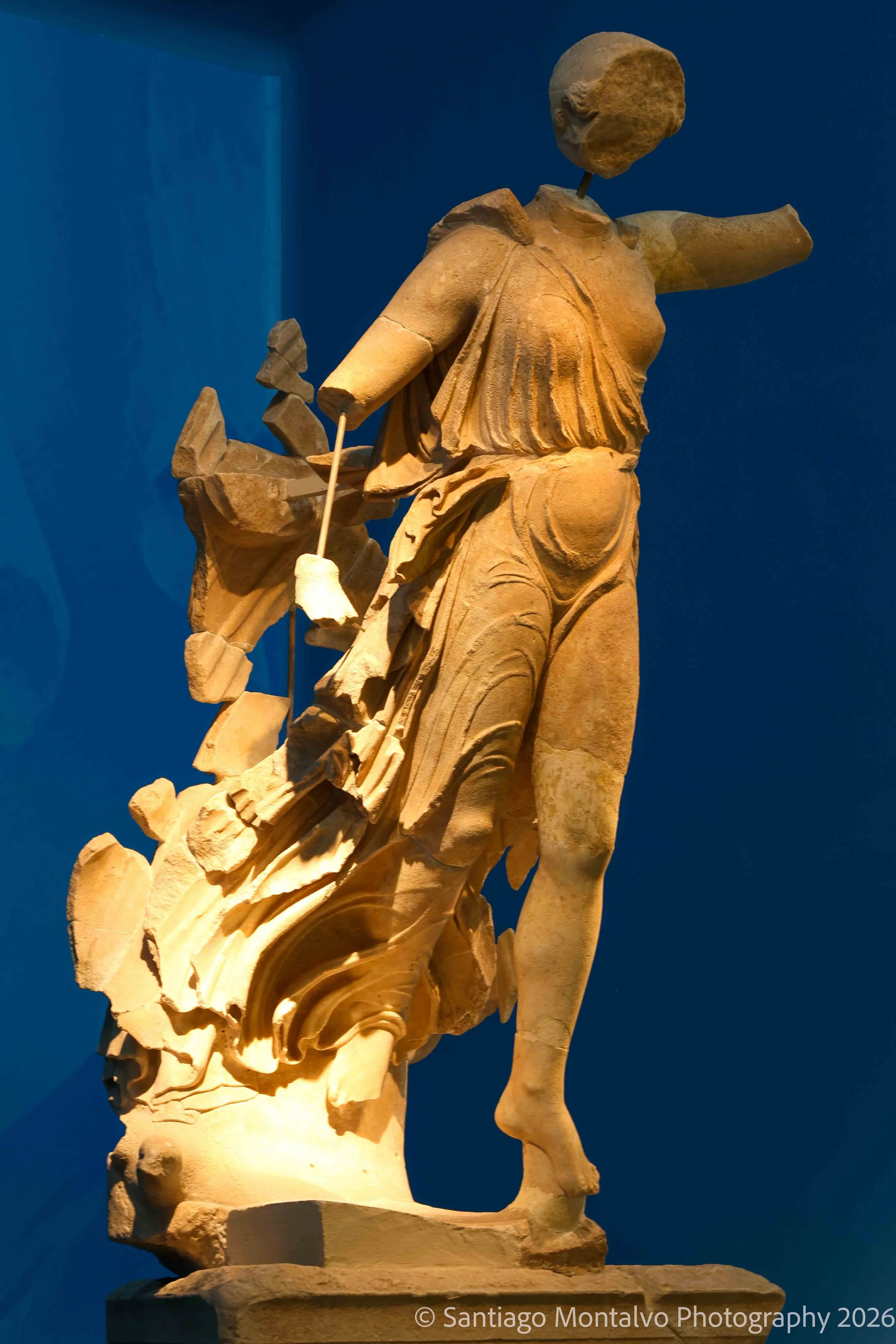 Classical Elegance — Olympia, Greece. An ancient sculptural figure reveals the enduring artistry of Greek civilization.