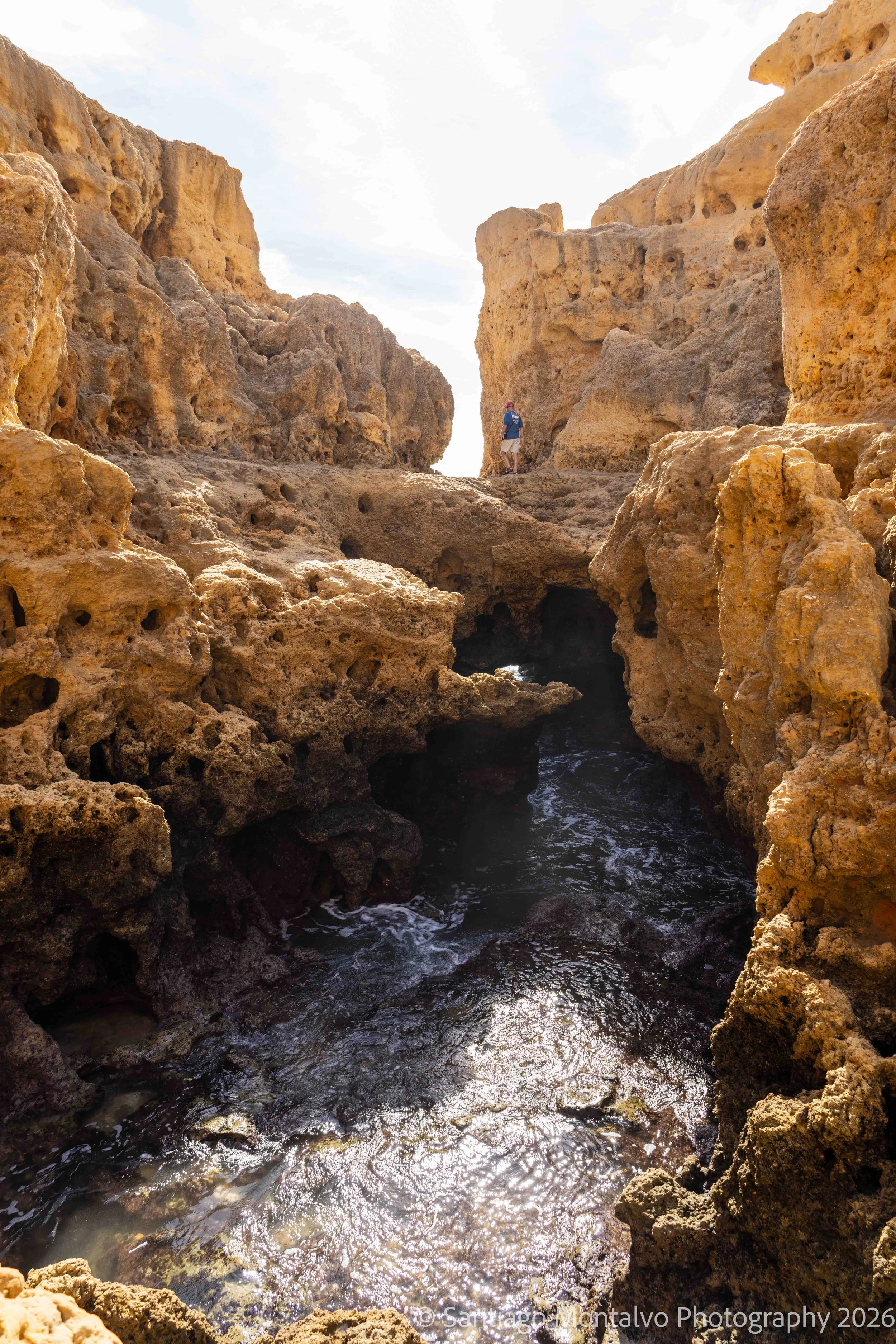 Between Rock and Sea — Lagos, Portugal. Atlantic waters flow between dramatic coastal formations.